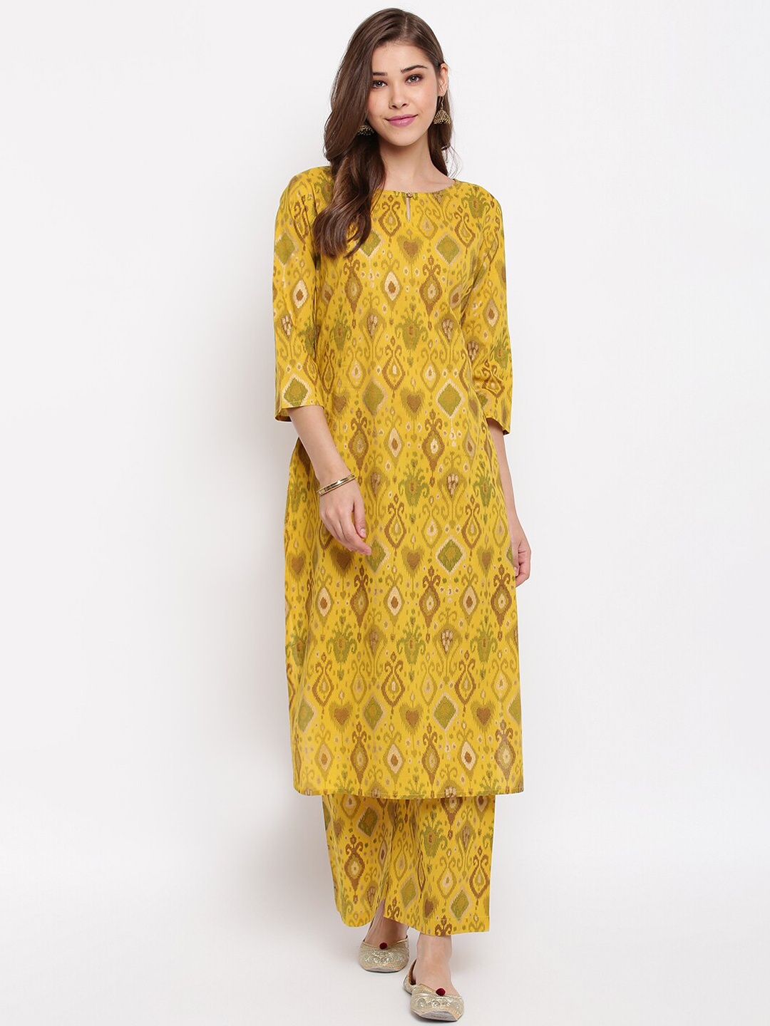 

Janasya Women Yellow Printed Kurta with Palazzos