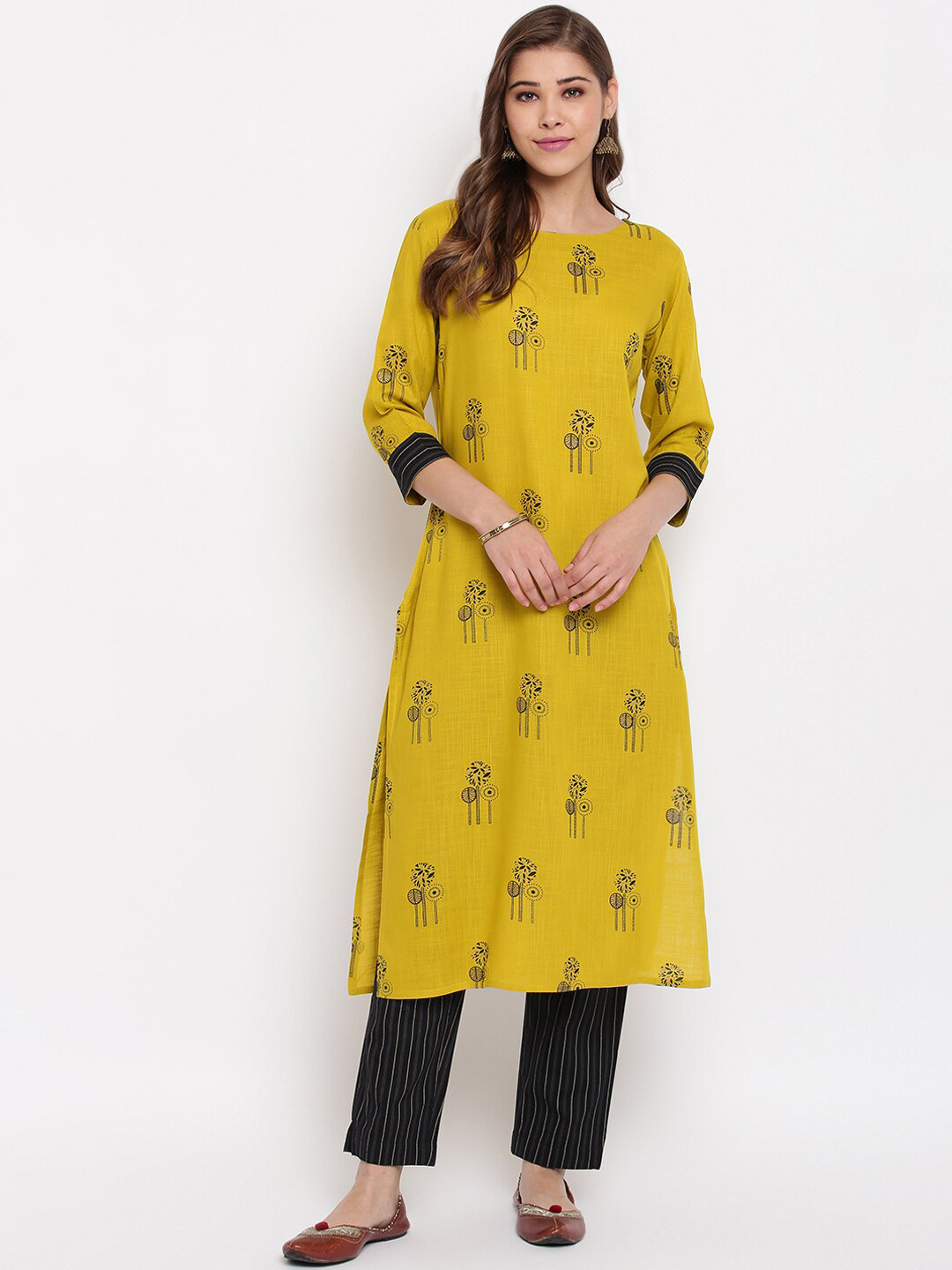 

Janasya Women Mustard Yellow & Black Printed Kurta with Trousers