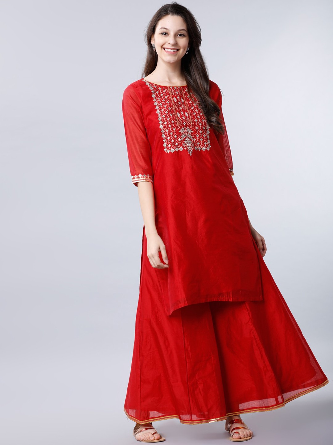 

Vishudh Women Red & Silver-Toned Embroidered Kurta with Palazzos