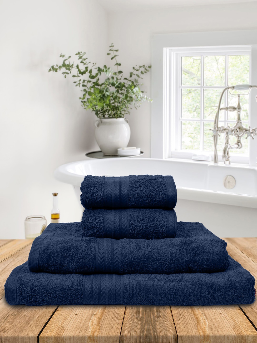 

BOMBAY DYEING Set Of 4 Blue Solid 550 GSM Tulip Towels