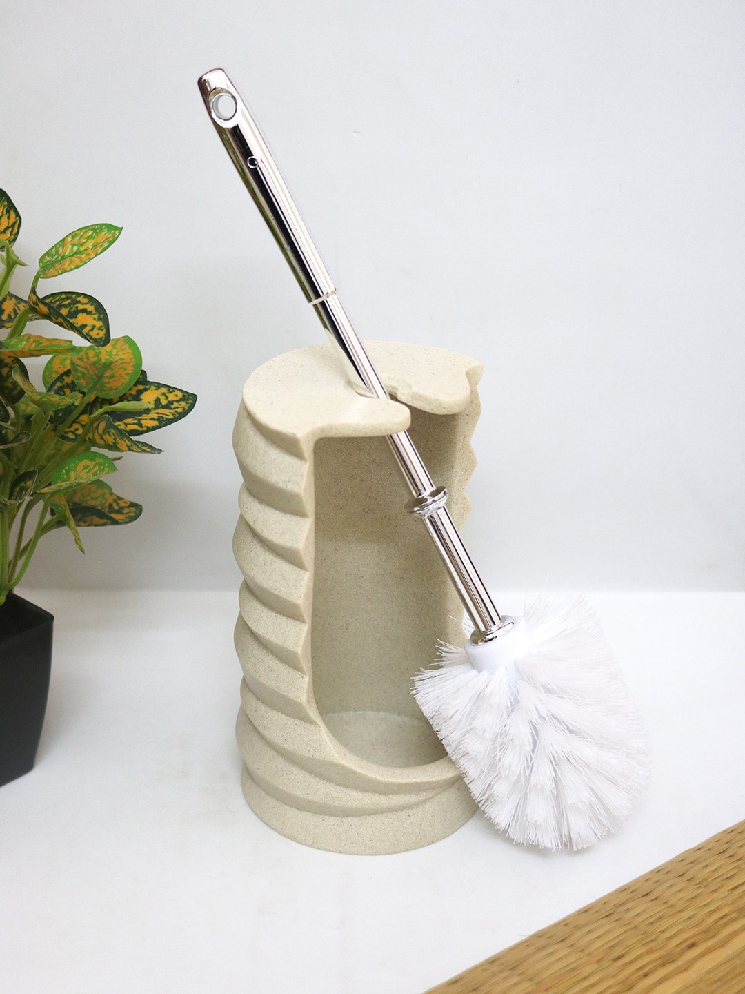 

Shresmo Beige Solid Toilet Brush Holder