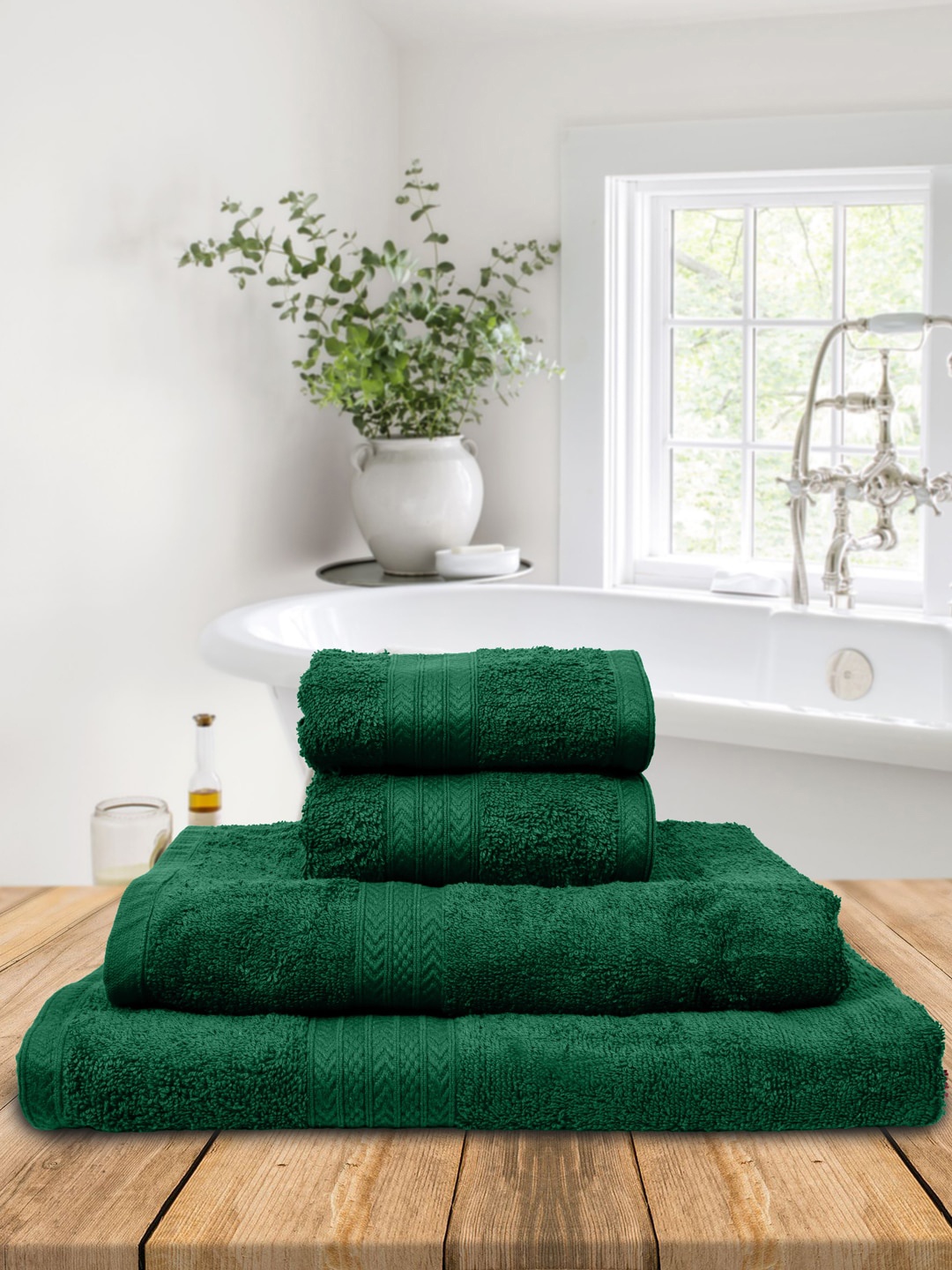 

BOMBAY DYEING Set Of 4 Green Solid 550 GSM Tulip Towels