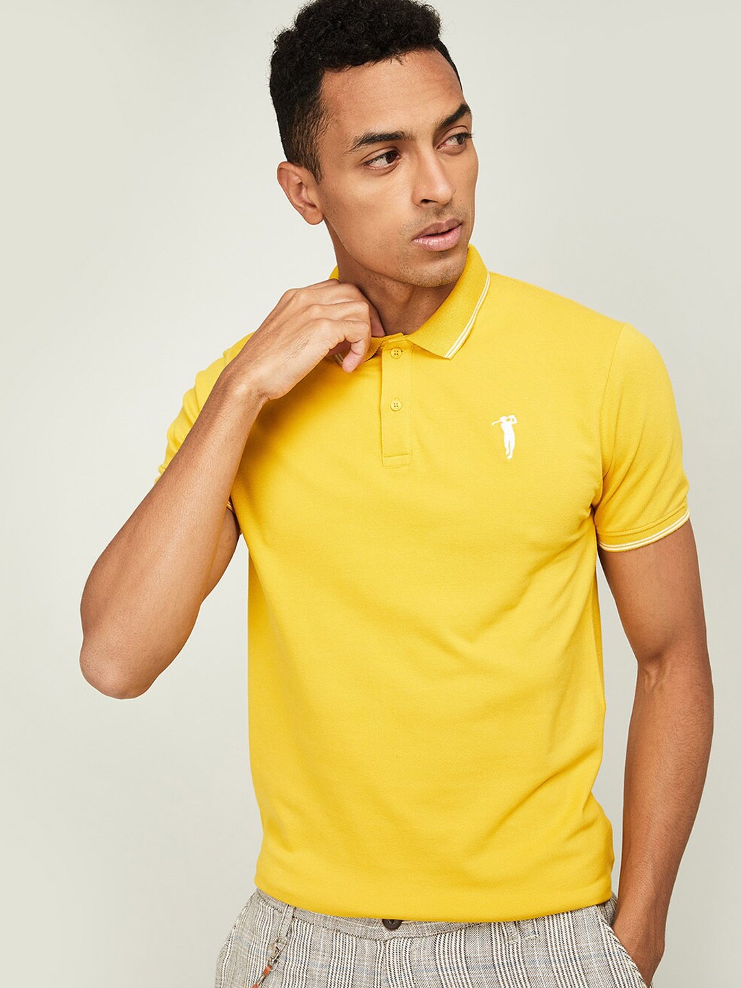 

Bossini Men Yellow Solid Polo Collar T-shirt