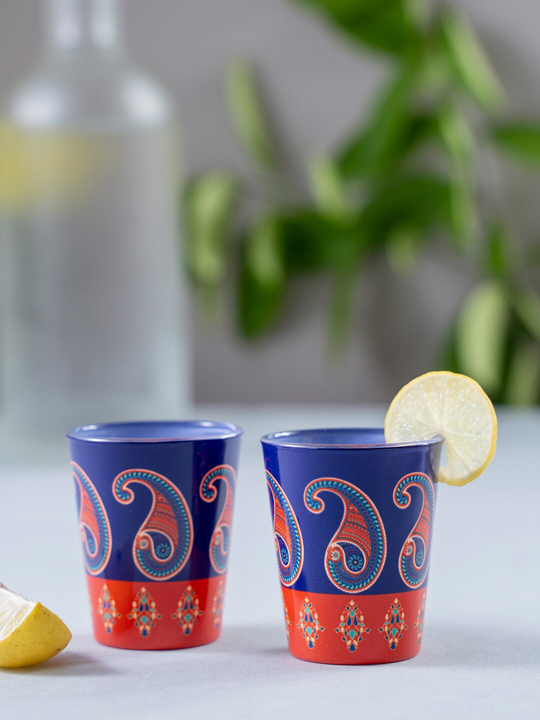 

KOLOROBIA Set Of 2 Blue & Red Paisley Printed Splendid Shot Glasses