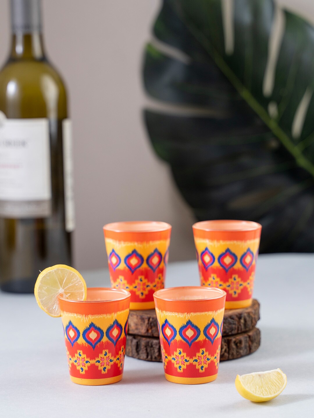 

KOLOROBIA Set Of 4 Orange & Yellow Dazzling Ikat Printed Shot Glasses