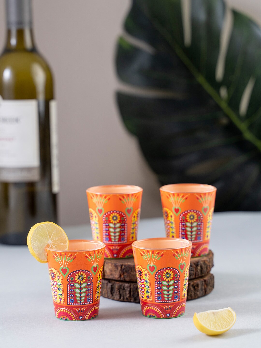 

KOLOROBIA Set Of 4 Orange & Red Truck Art Jharokha Printed Shot Glasses 30ml