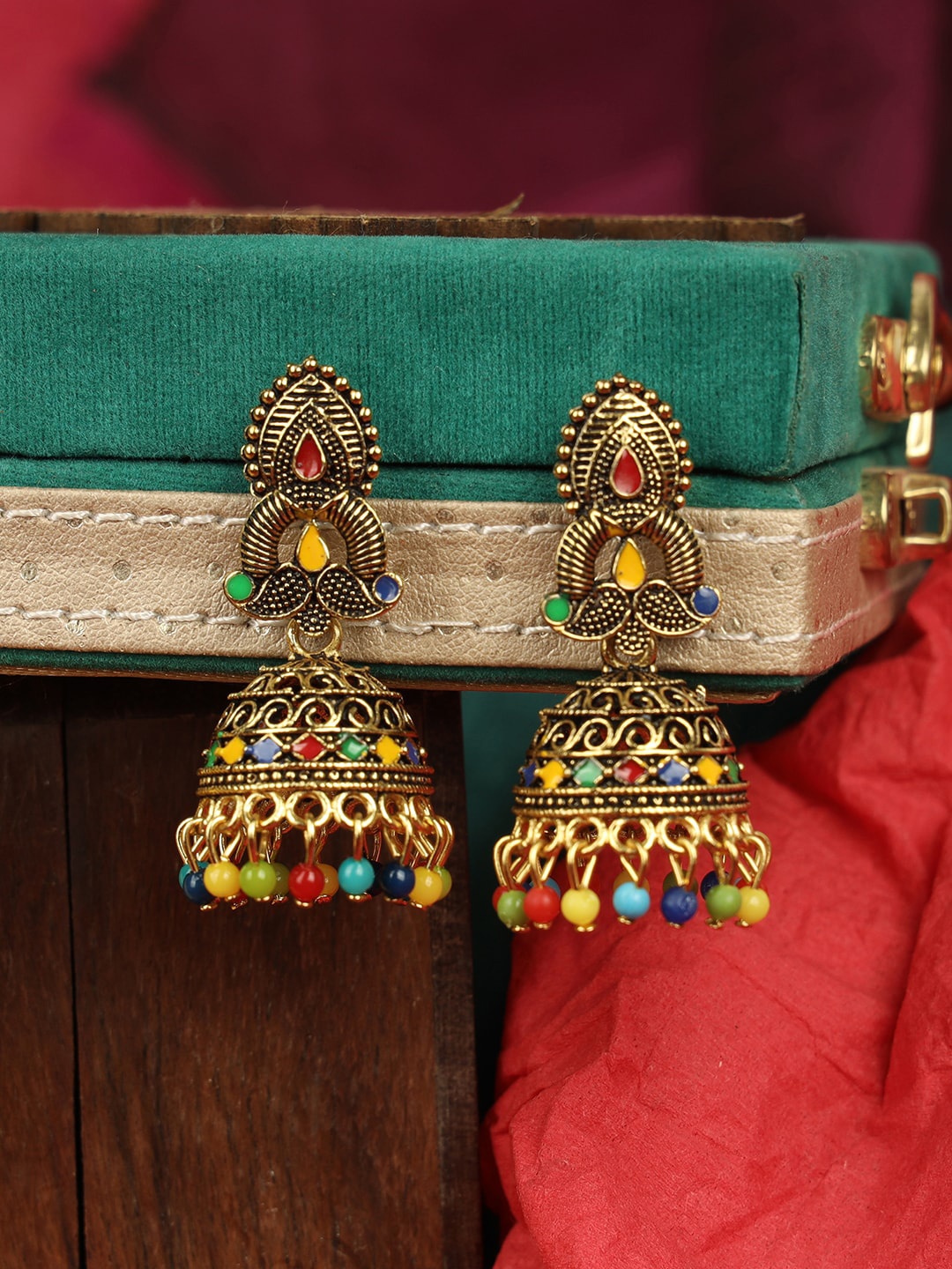

ANIKAS CREATION Gold-Plated Contemporary Jhumkas
