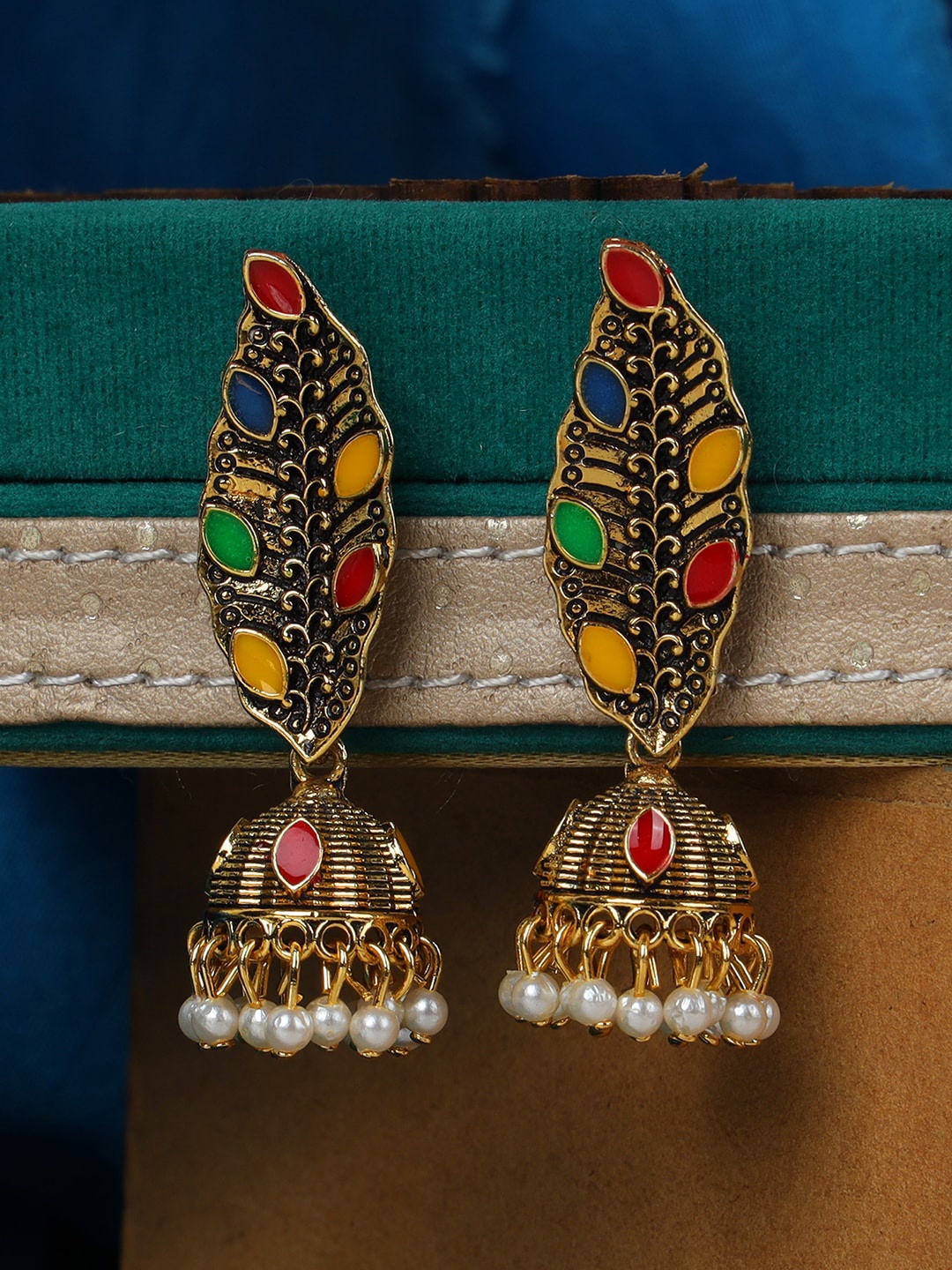 ANIKAS CREATION Gold-Plated Leaf Shaped Jhumkas