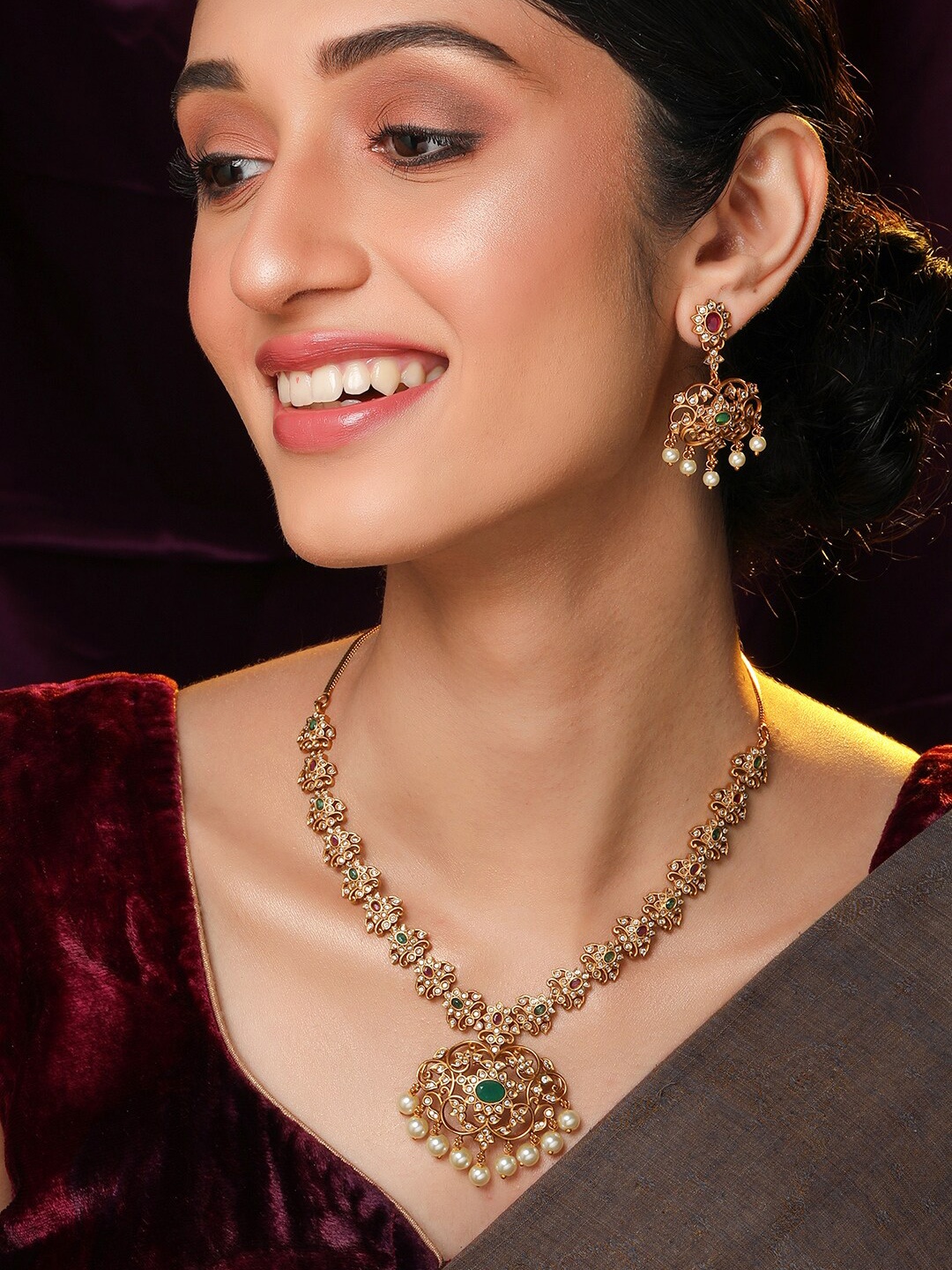 

Rubans 24K Gold Plated Ruby & Emerald Stone Studded with Pearl Beads Floral Jewellery Set