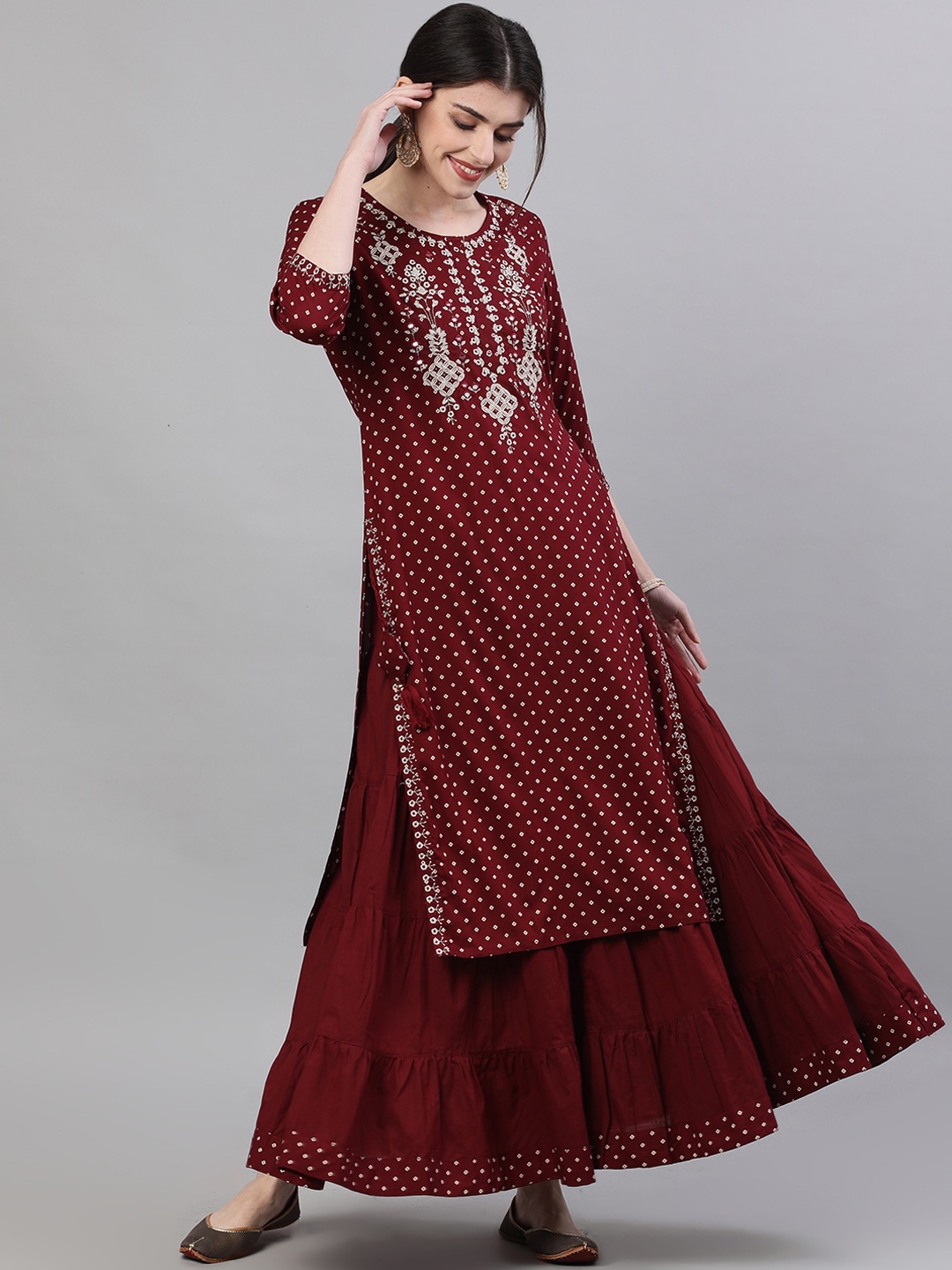 

Ishin Women Maroon Embroidered Kurta with Skirt