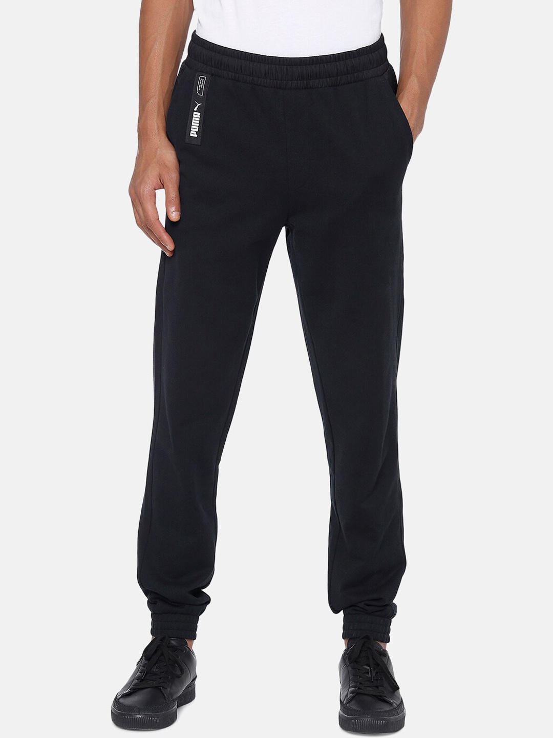 

Puma Men Black Solid Straight Fit NU-TILITY Knit Track Pants
