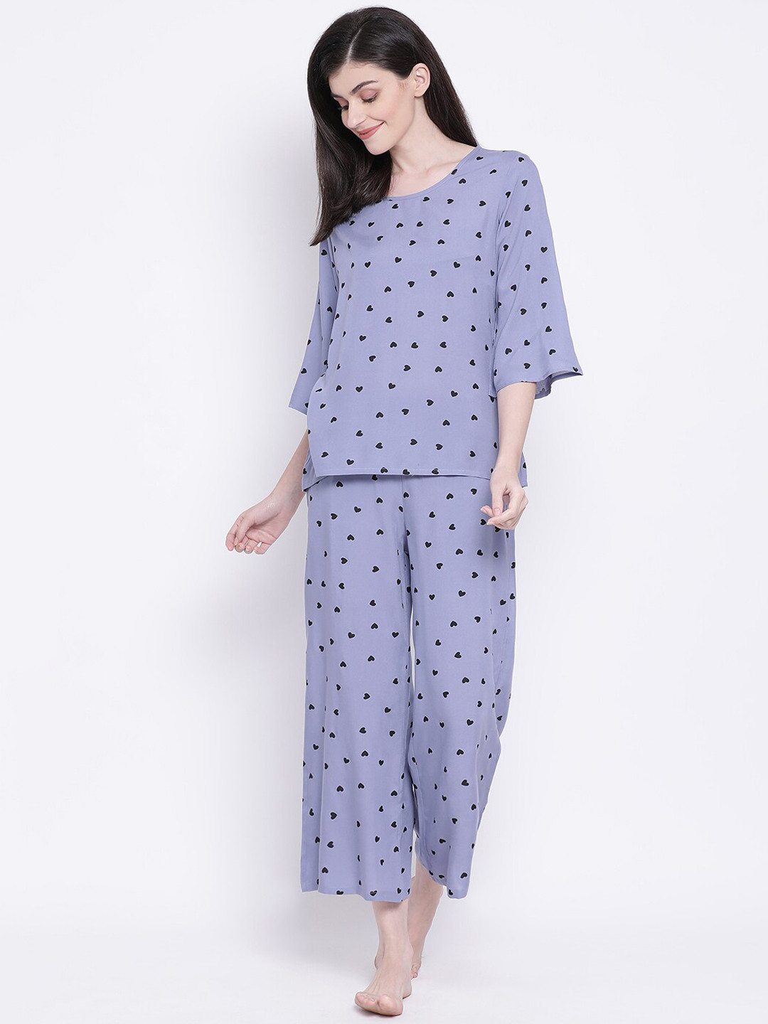 

Clovia Women Purple & Black Printed Night Suit