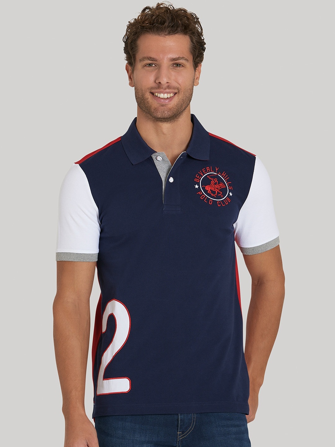 

Beverly Hills Polo Club Men Navy Blue Colourblocked Polo Collar T-shirt