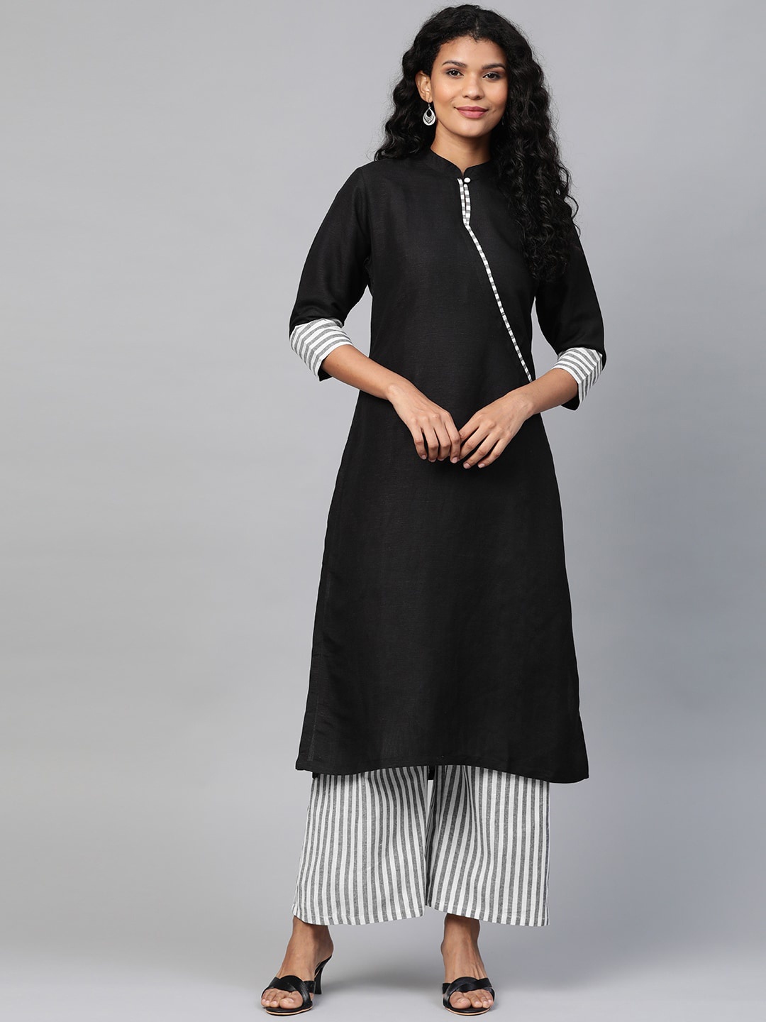 

Laado - Pamper Yourself Women Black Solid A-Line Sustainable Kurta