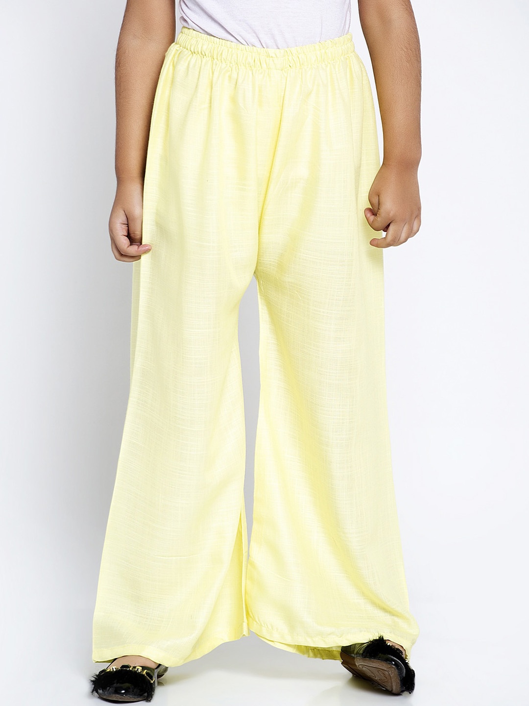 

Baani Creations Girls Yellow Solid Flared Palazzos