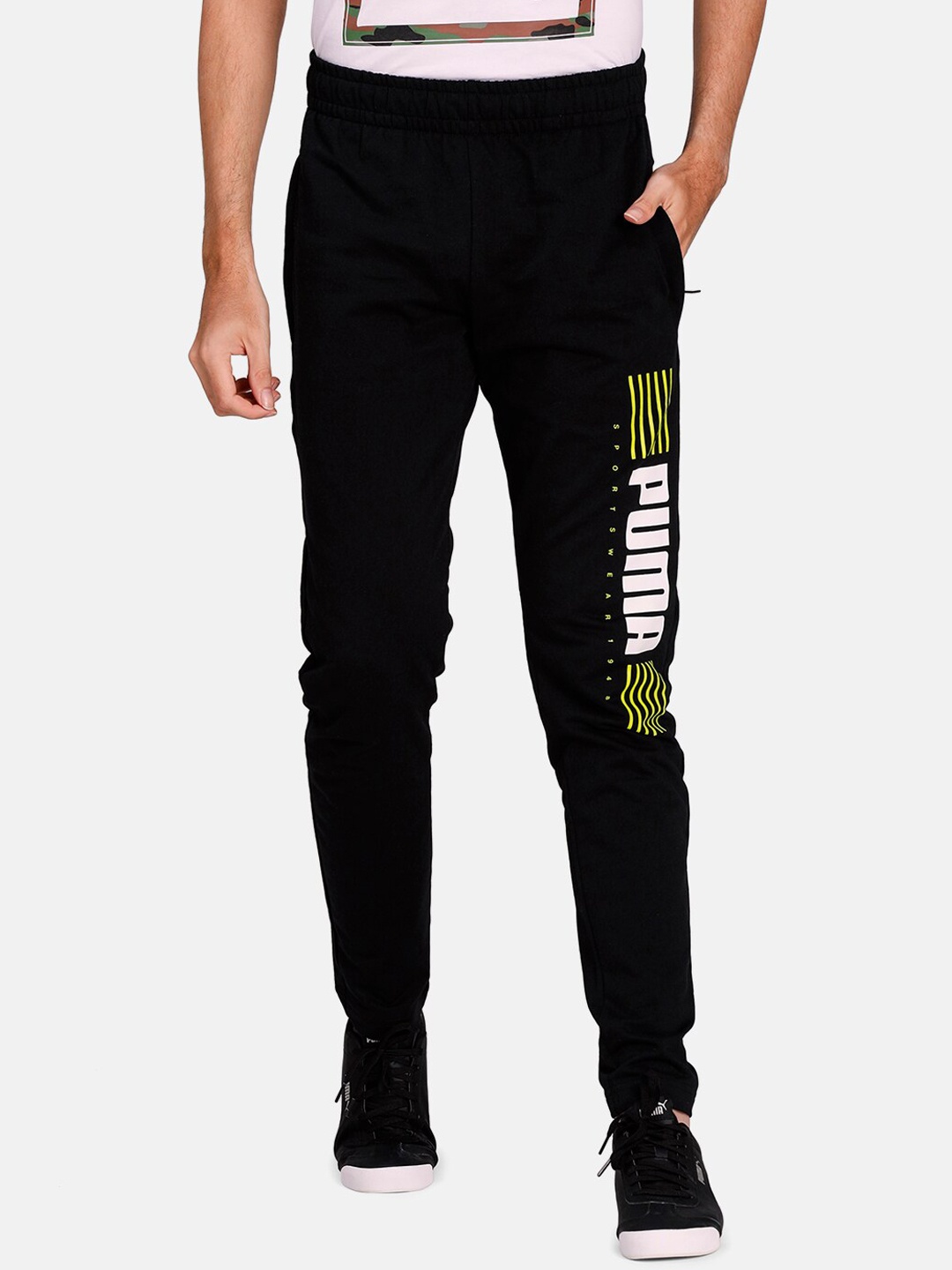 

Puma Men Black Solid Slim Fit Sports 1948 Pants