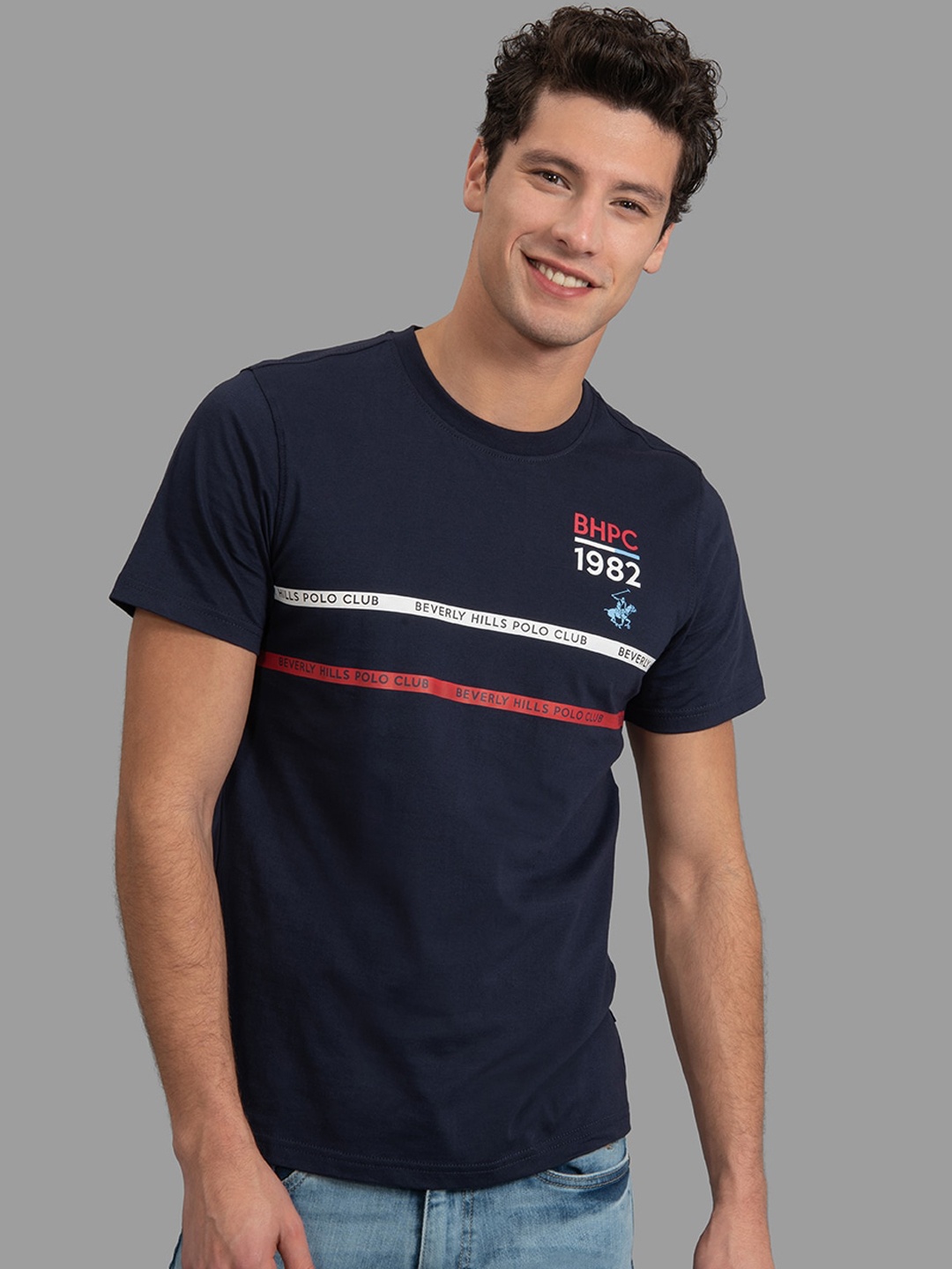 

Beverly Hills Polo Club Men Navy Blue Striped Round Neck T-shirt