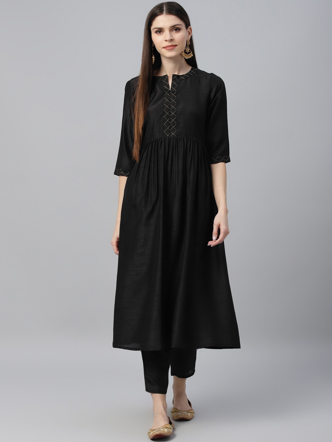 

Libas Women Black Solid Kurta with Trousers