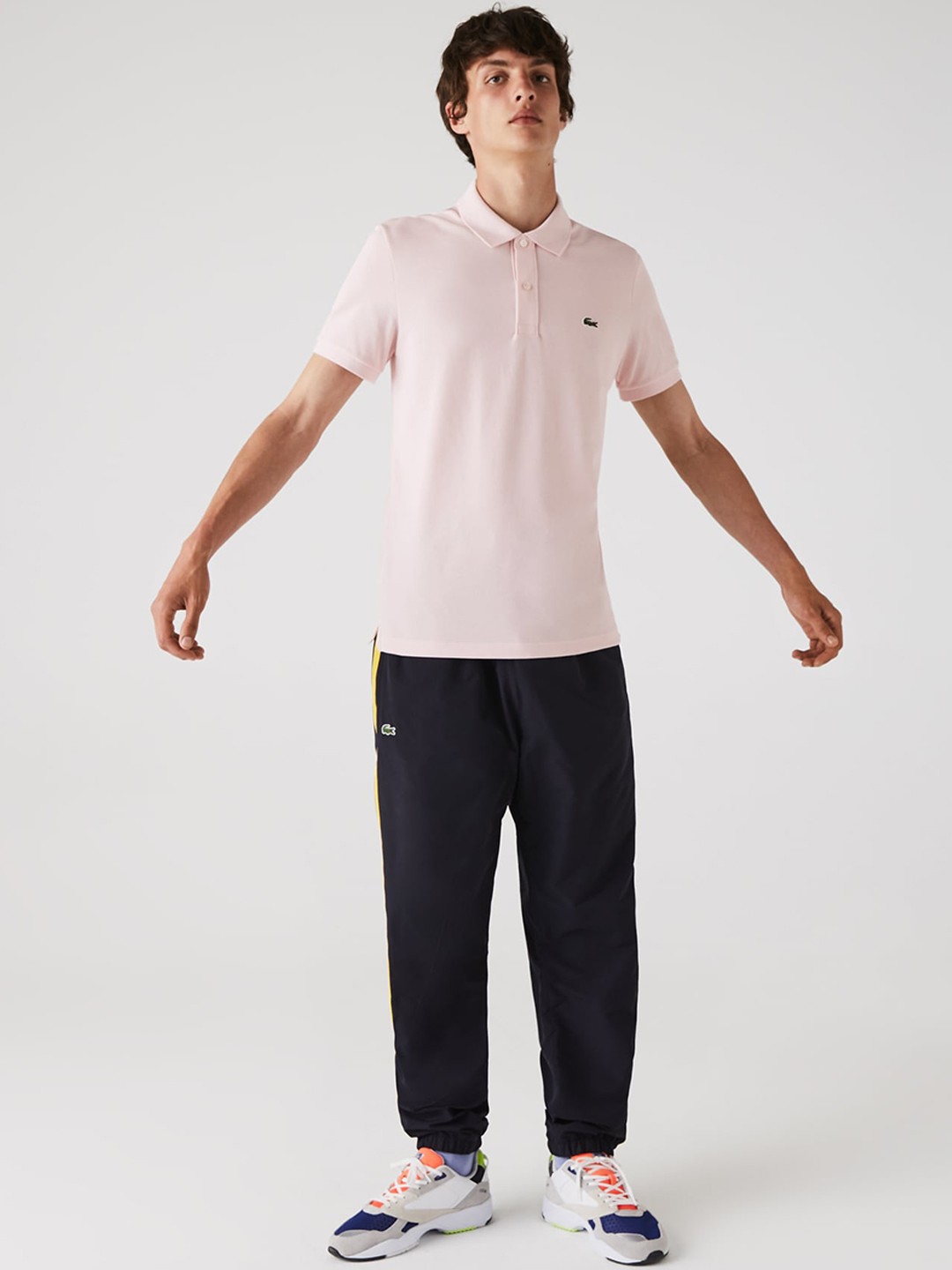 

Lacoste Men Pink Solid Polo Collar T-shirt