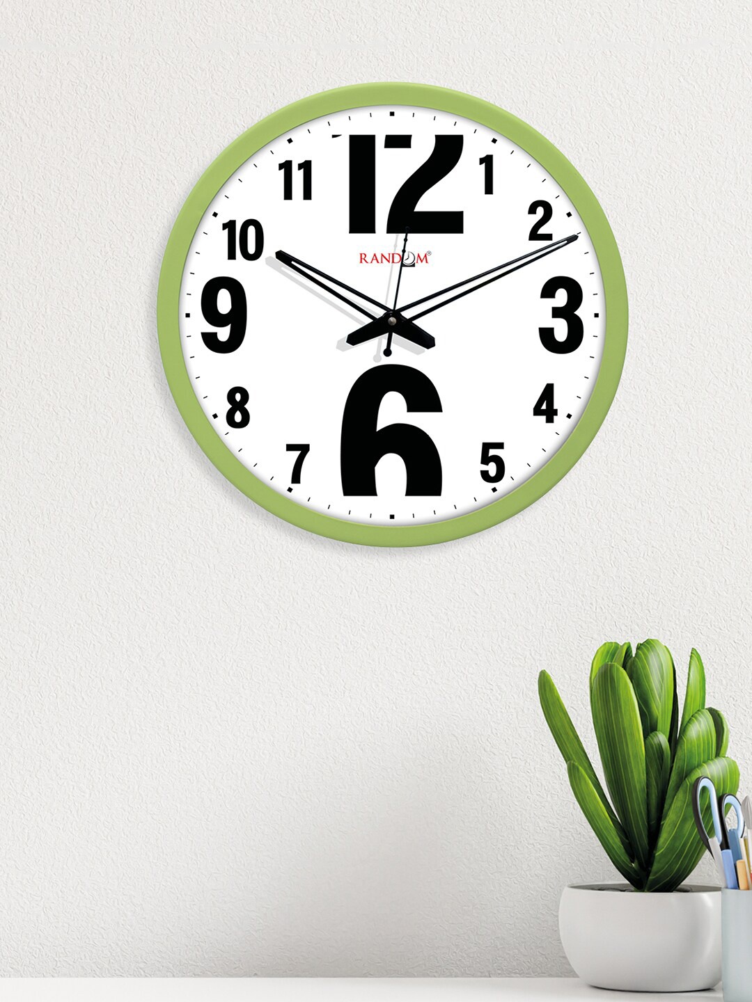 

RANDOM Green & White Side Cut Font Round Shaped Wall Clock