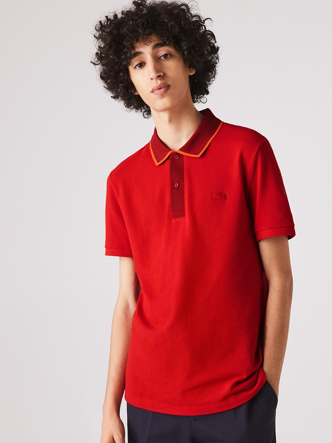 

Lacoste Men Red Solid Polo Collar Pure Cotton T-shirt