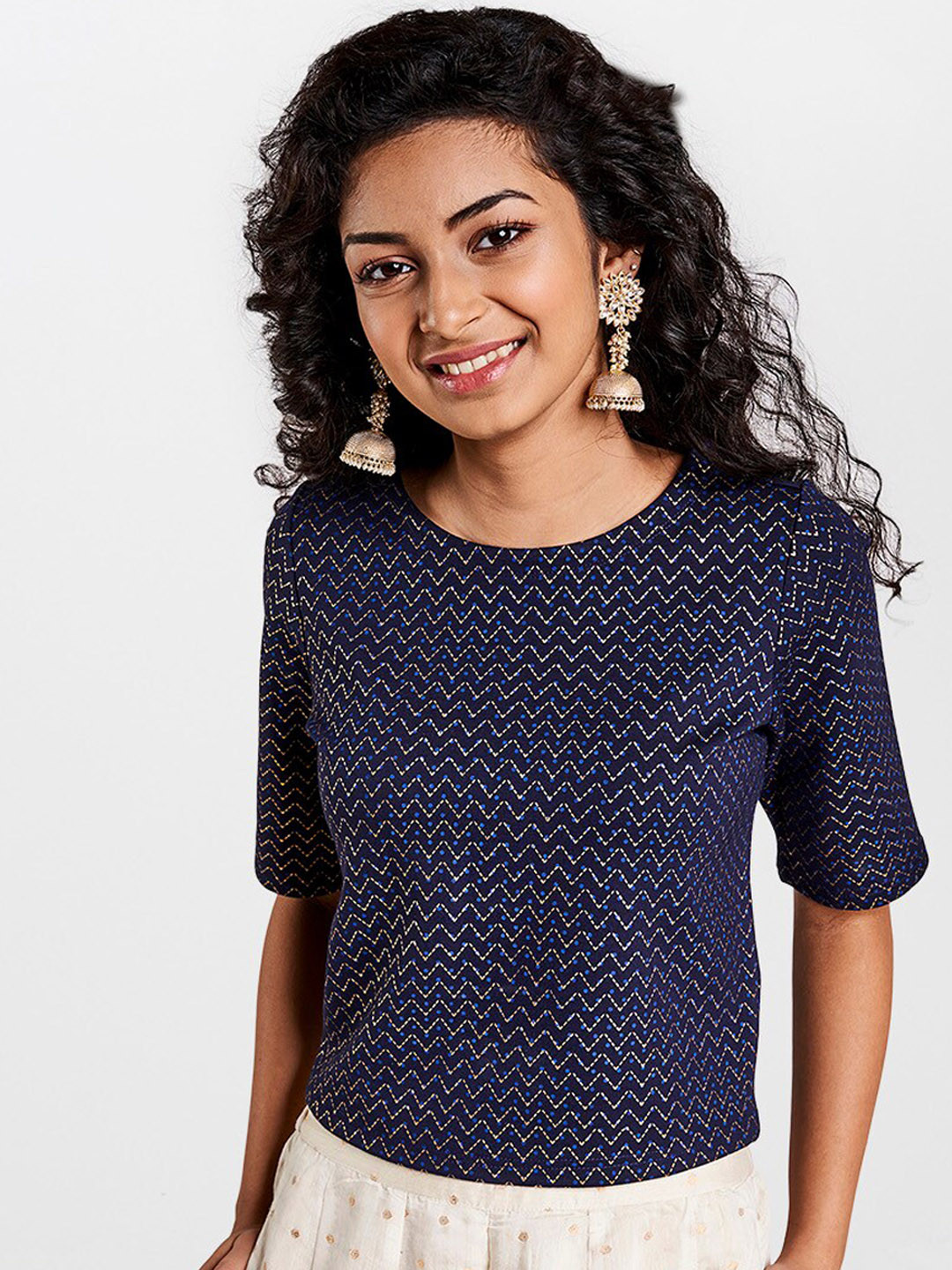 

Global Desi Women Navy Blue & Gold-Coloured Printed Top