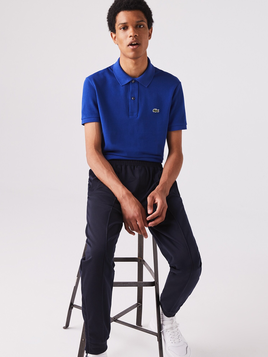 

Lacoste Men Blue Solid Polo Collar T-shirt