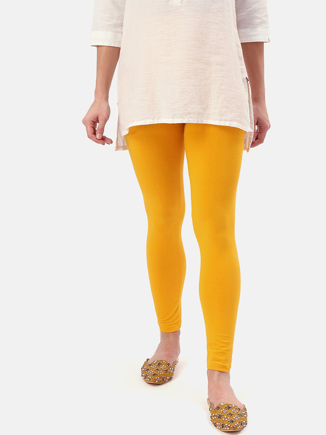 

Saaki Women Yellow Solid Ankle-Length Leggings