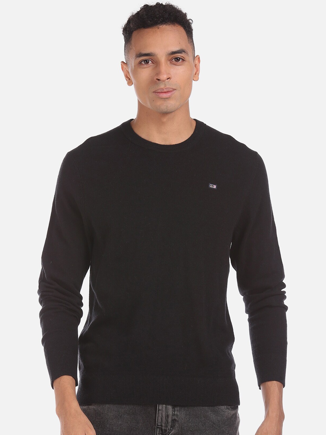 

Arrow Sport Men Black Solid Pullover sweater