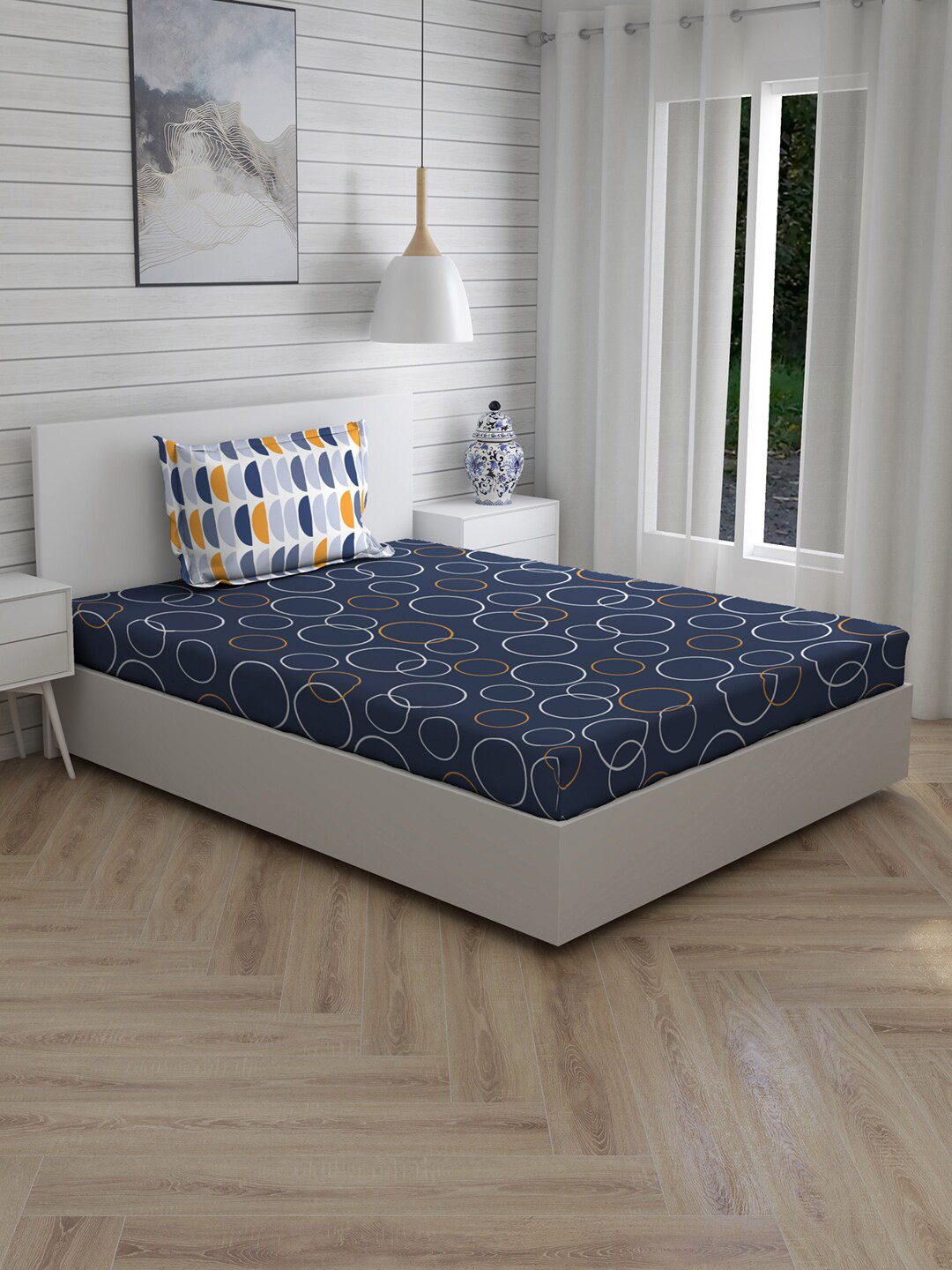 

Layers Navy Blue & White Geometric 120 TC Cotton 1 Single Bedsheet with 1 Pillow Covers