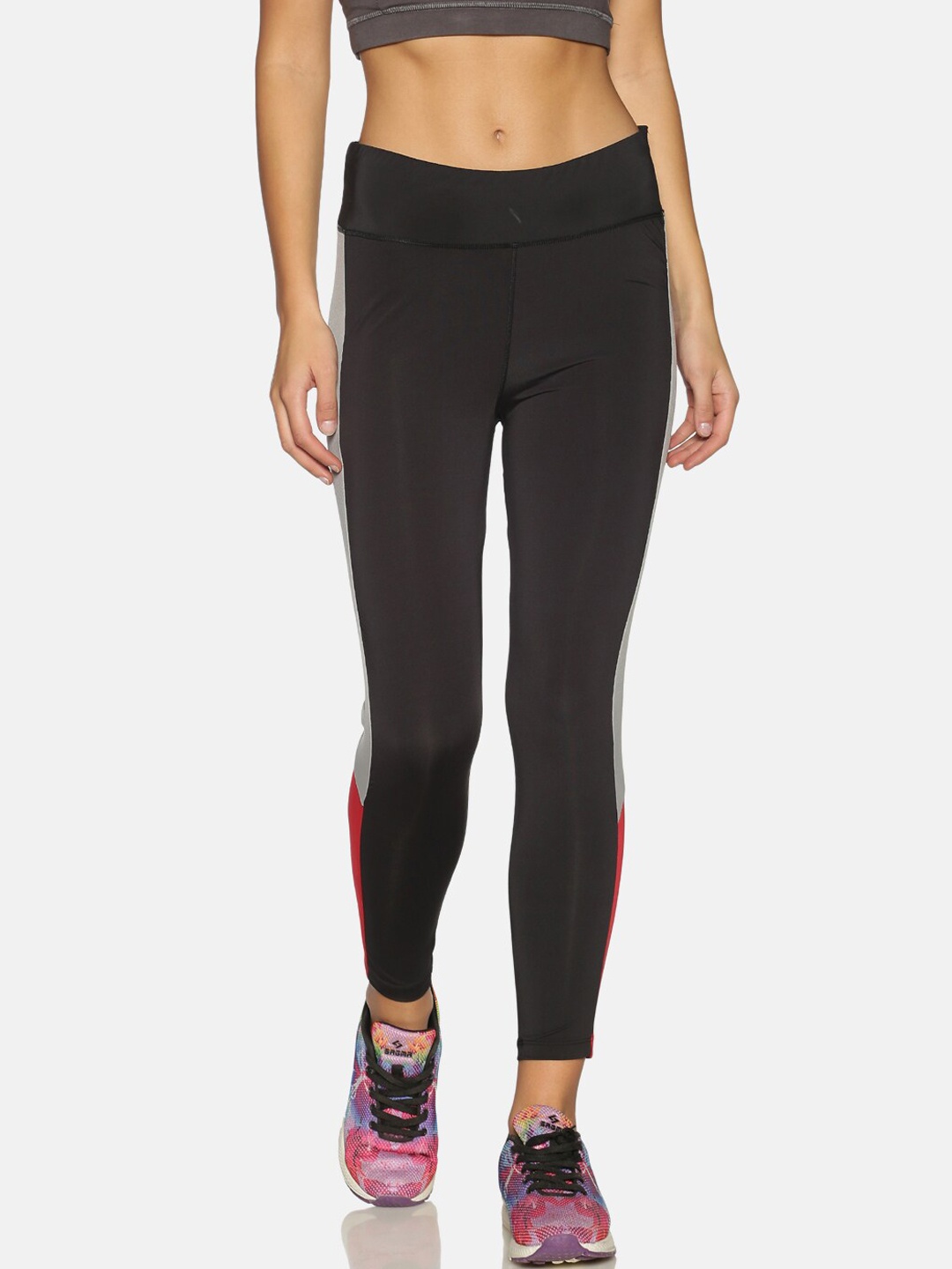 

Campus Sutra Women Black Solid Sports Dry-Fit Tights with Side Striped