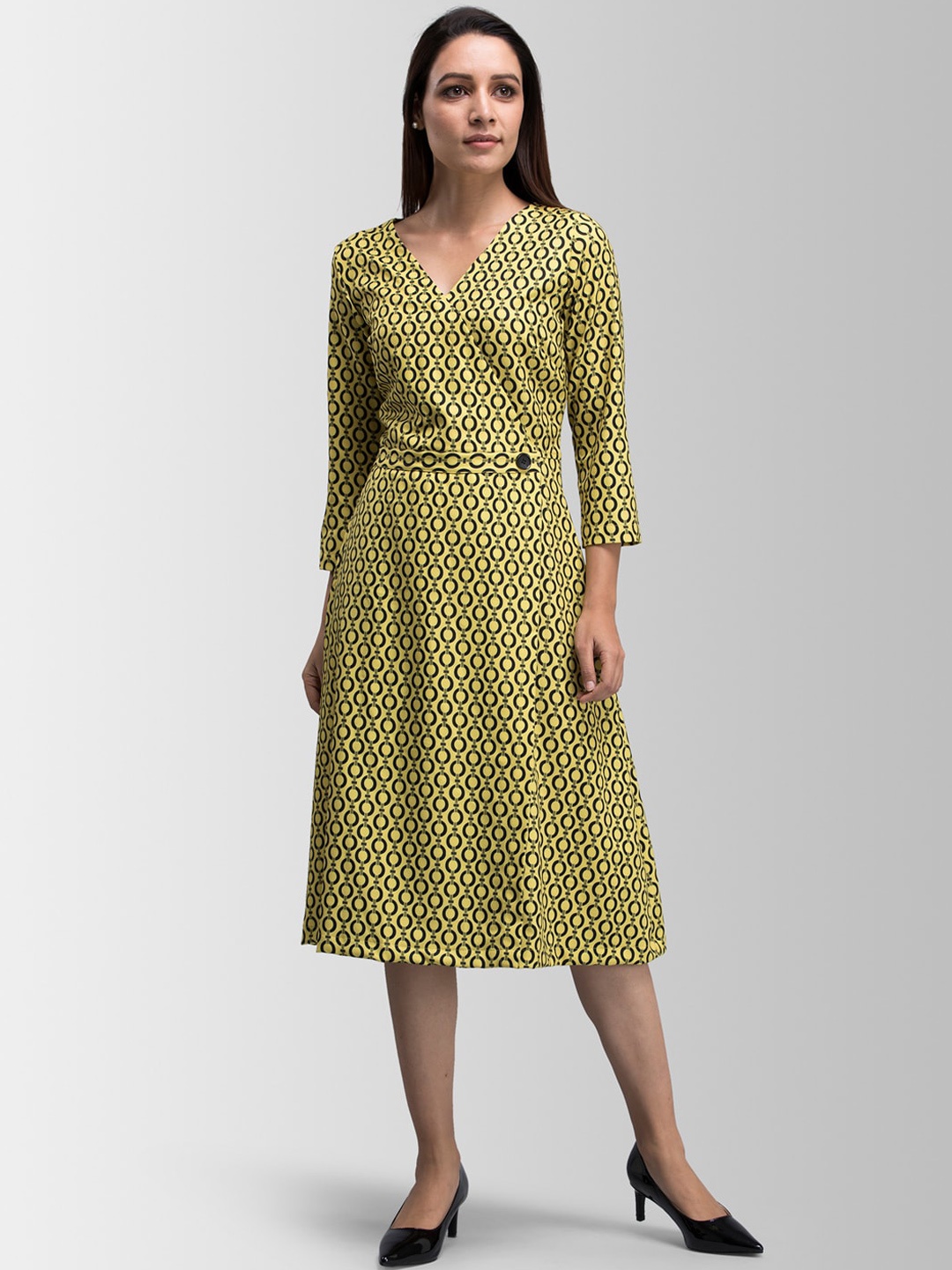 

FableStreet Women Yellow Printed Wrap Dress