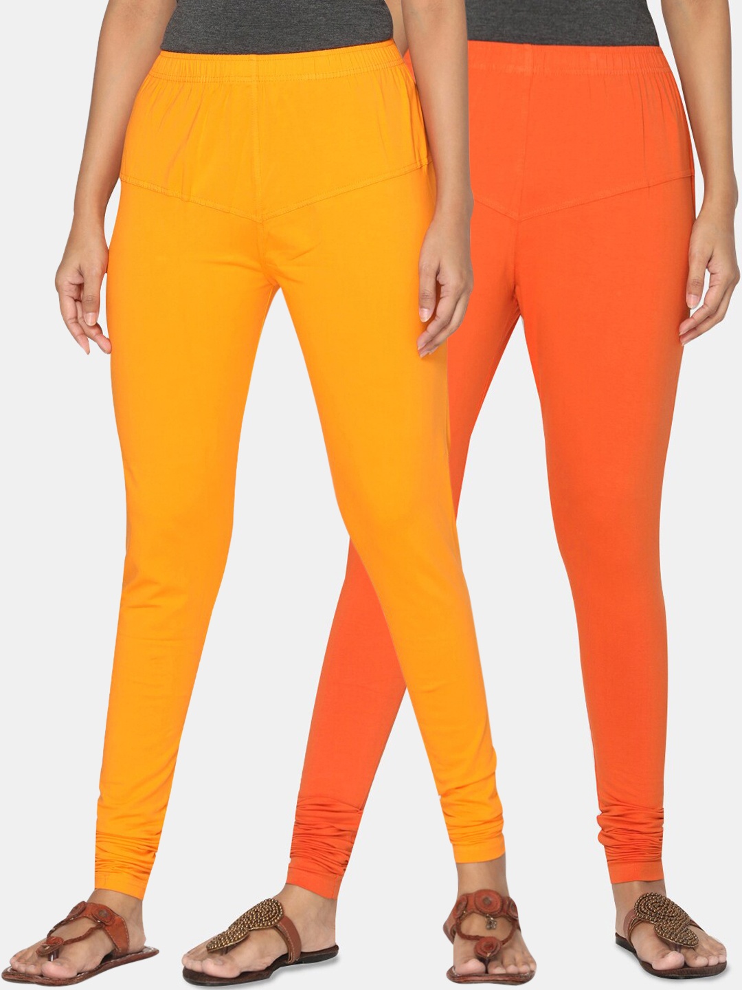 

TSG Bliss Women Pack Of 2 Orange & Yellow Solid Churidar-Length leggings