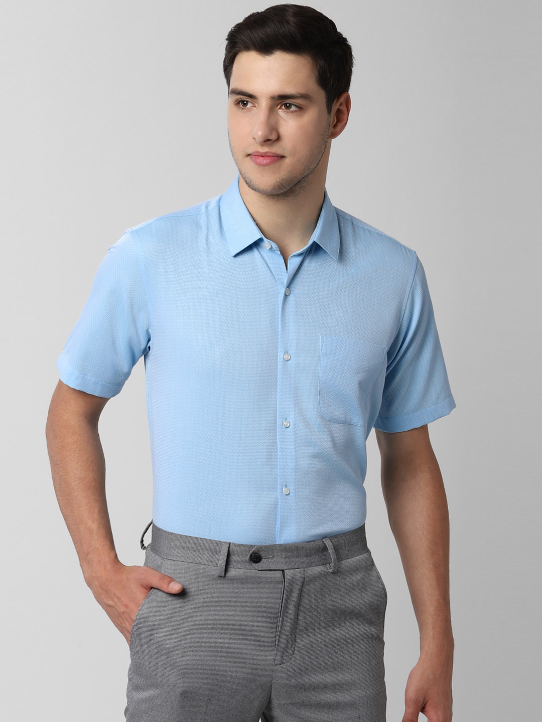 

Peter England Men Blue Regular Fit Self Design Formal Shirt