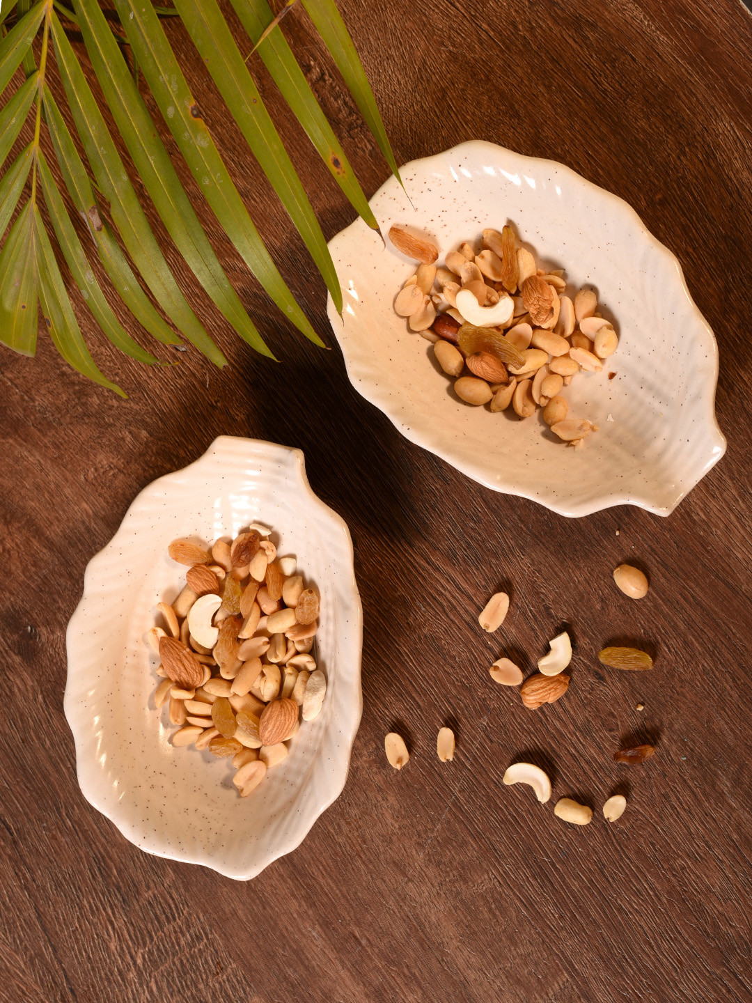 

Unravel India Set of 2 White Ceramic Leaf-Shaped Trays