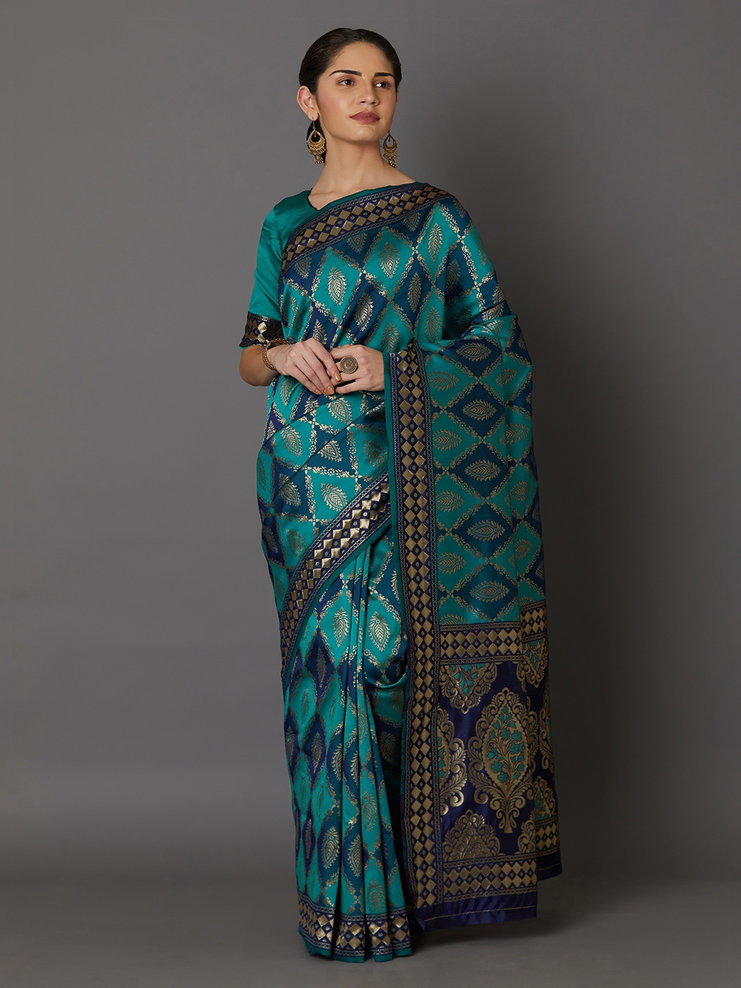 

Mitera Teal Green Silk Blend Woven Design Kanjeevaram Saree