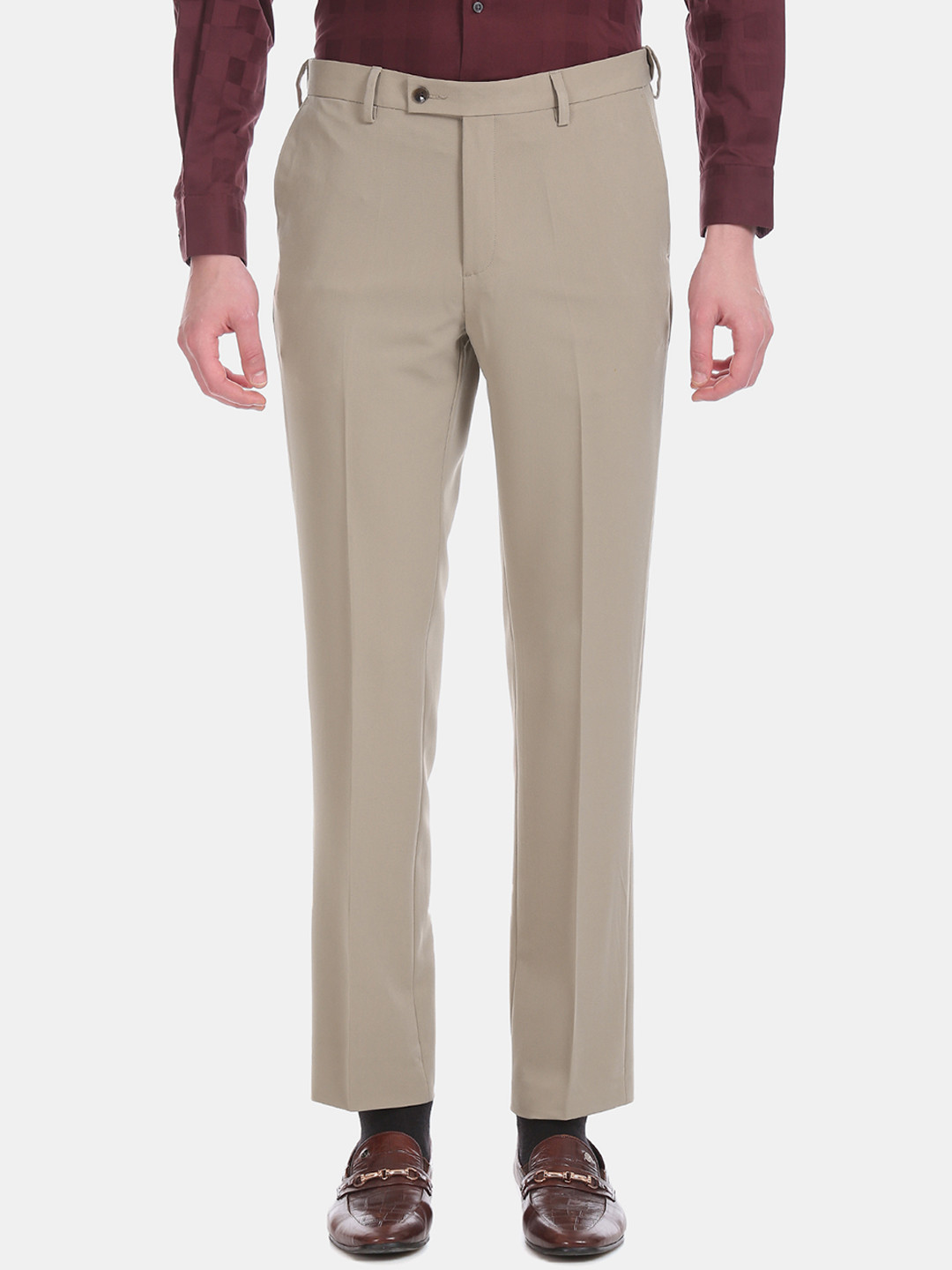 

Arrow Men Beige Tapered Fit Solid Regular Trousers