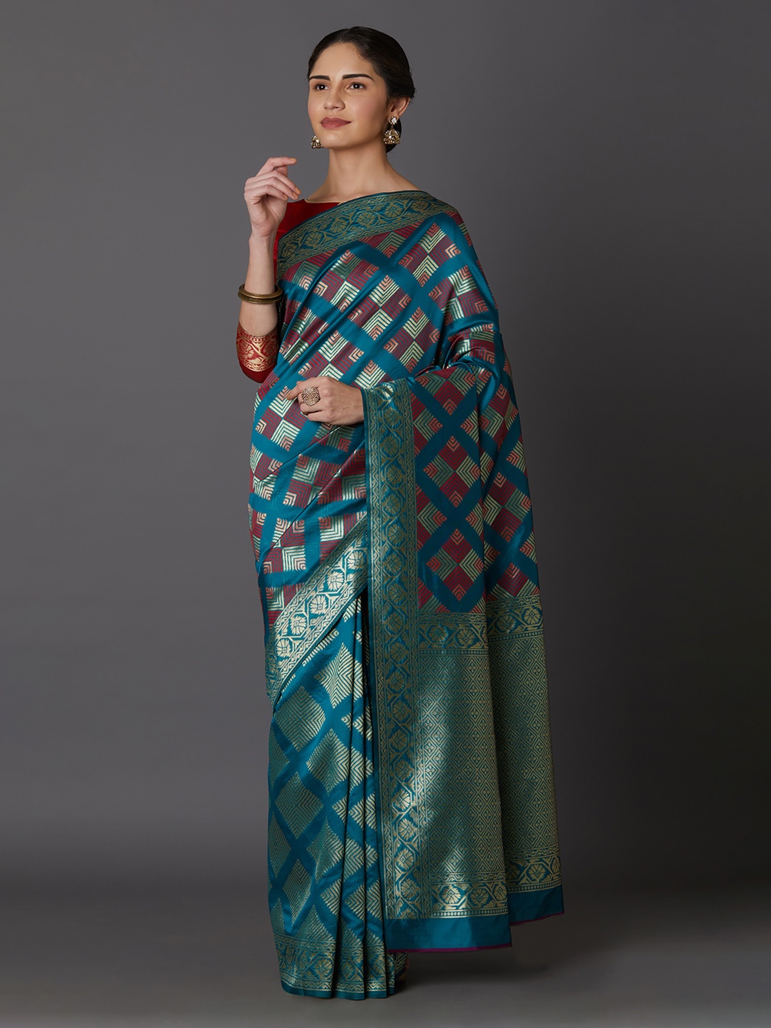 

Mitera Teal Green & Red Silk Blend Woven Design Kanjeevaram Saree