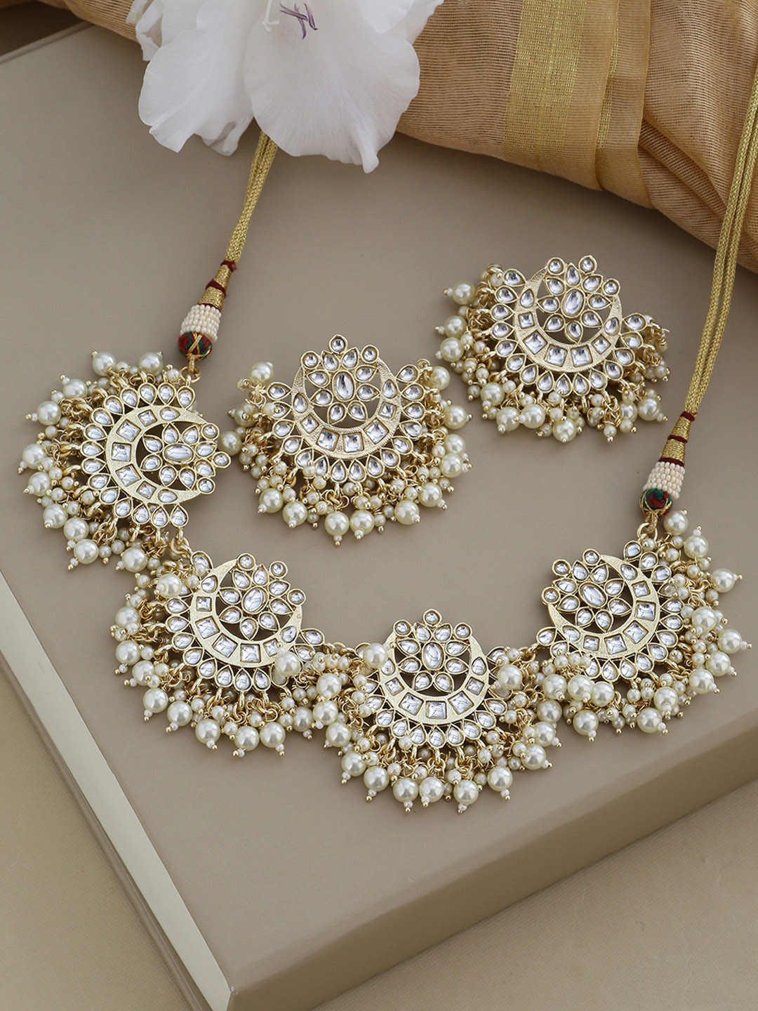 

Shoshaa Gold-Plated & Off-White Kundan & Pearl Embellished Jewellery Set