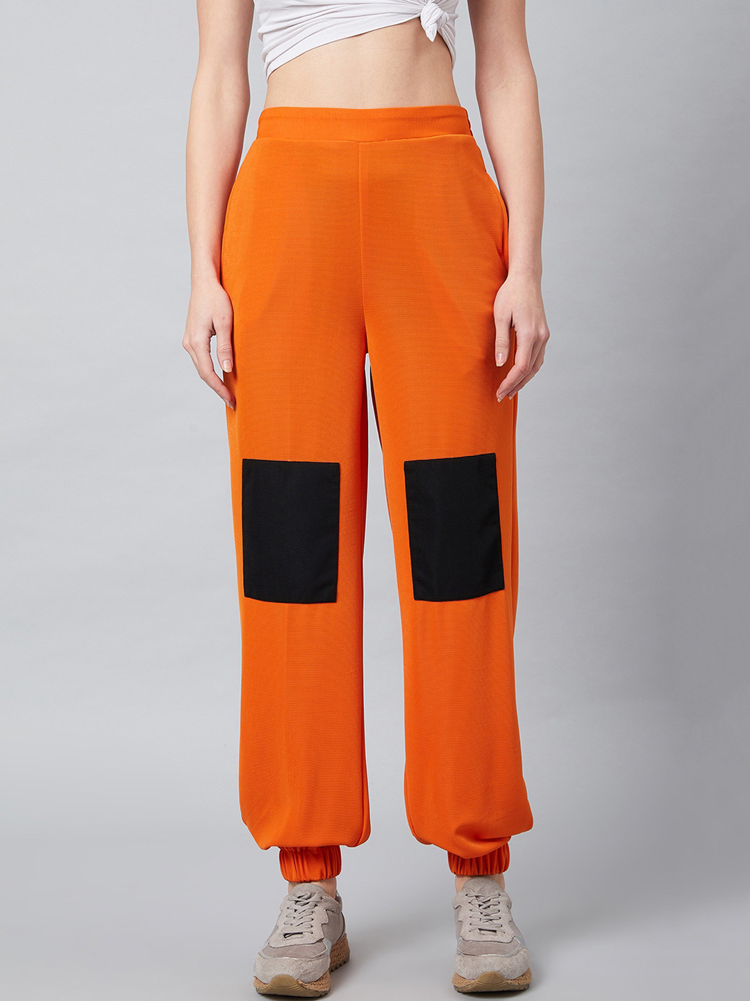 

Athena Women Orange & Black Loose Fit Solid Joggers