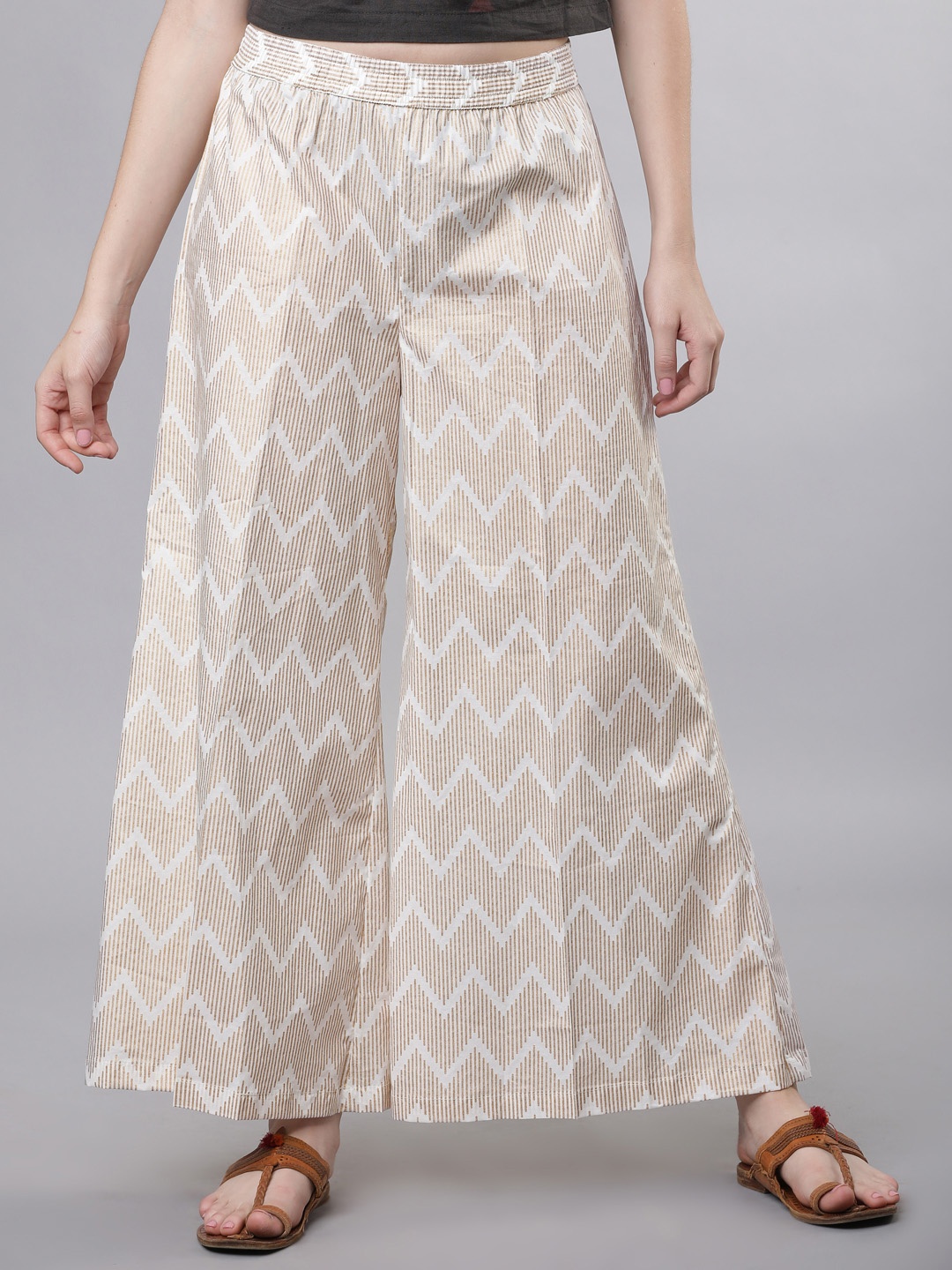 

Vishudh Women Off-White & Gold-Coloured Printed Flared Palazzos