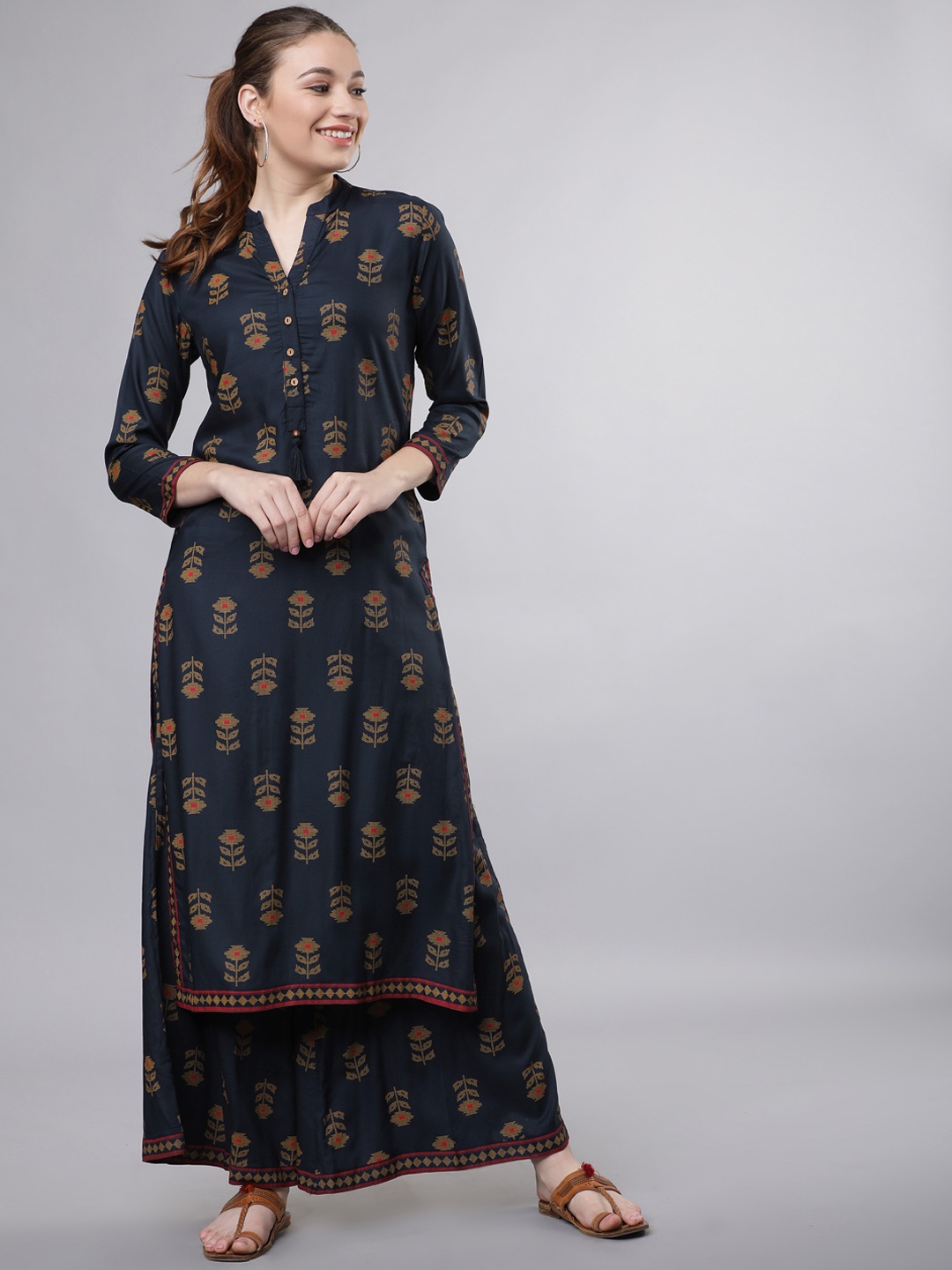 

Vishudh Women Navy Blue & Mustard Printed Kurta with Palazzos