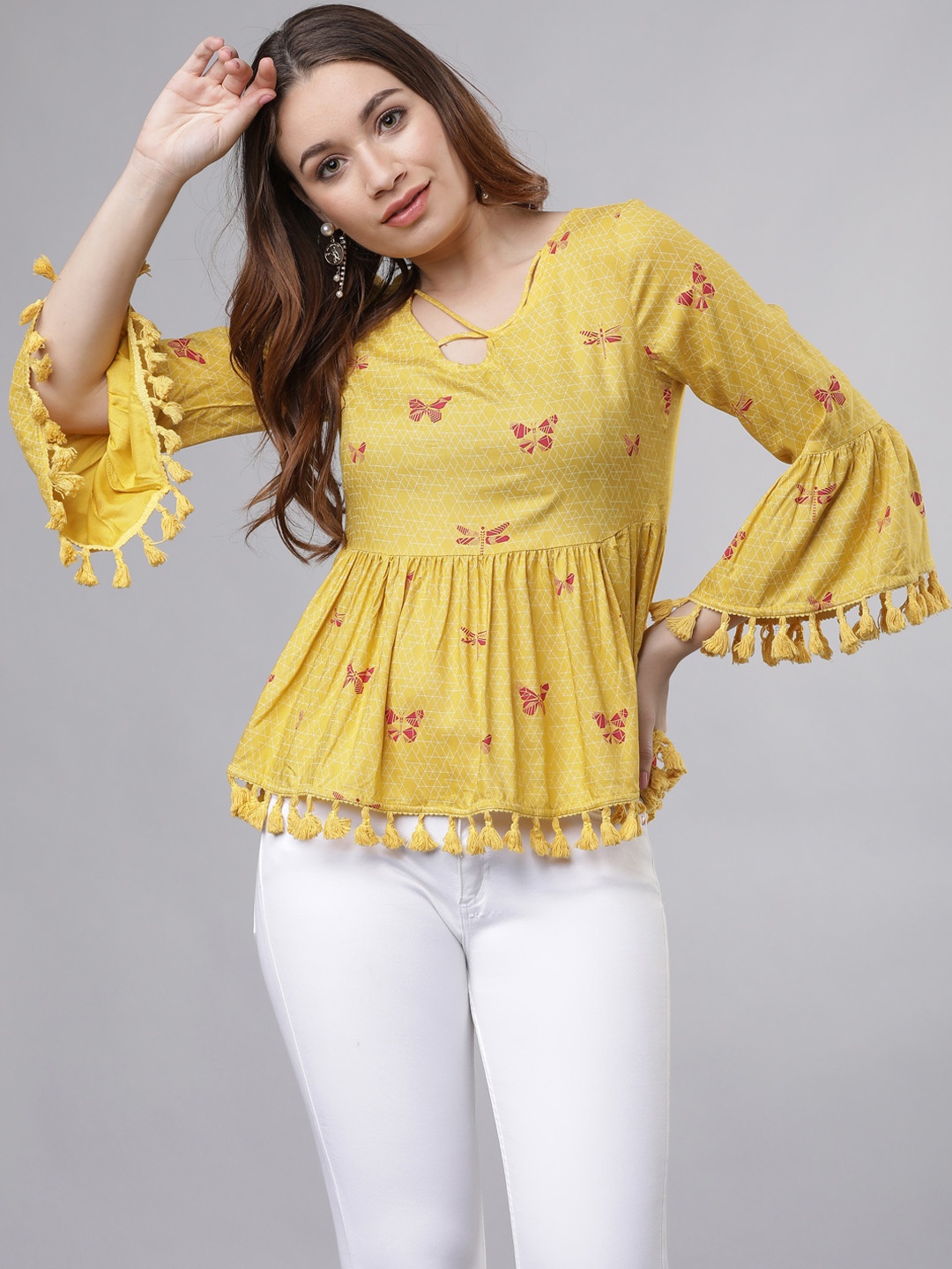 

Vishudh Women Mustard Printed Empire Top