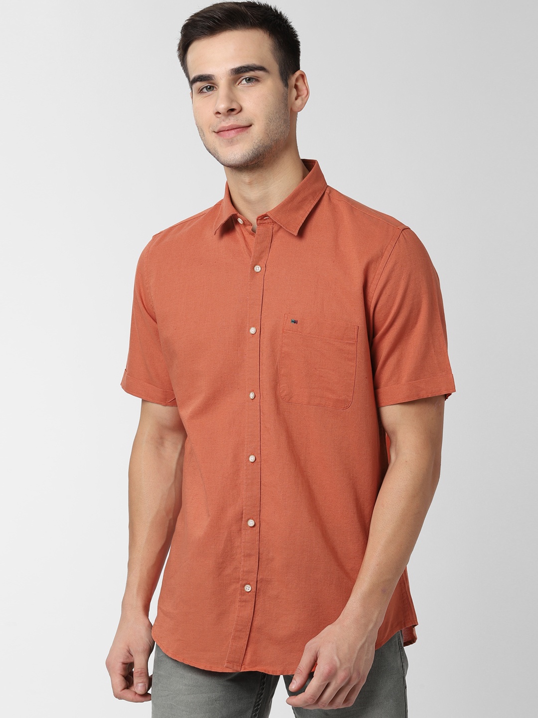 

Peter England Casuals Men Rust Orange Slim Fit Solid Casual Shirt