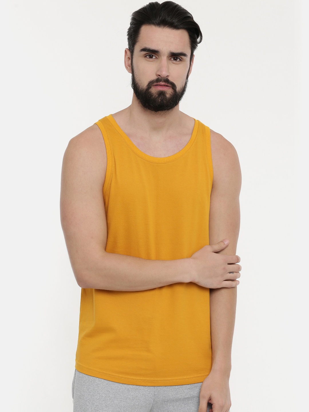 

Bushirt Men Mustard Yellow Solid Round Neck Pure Cotton T-shirt