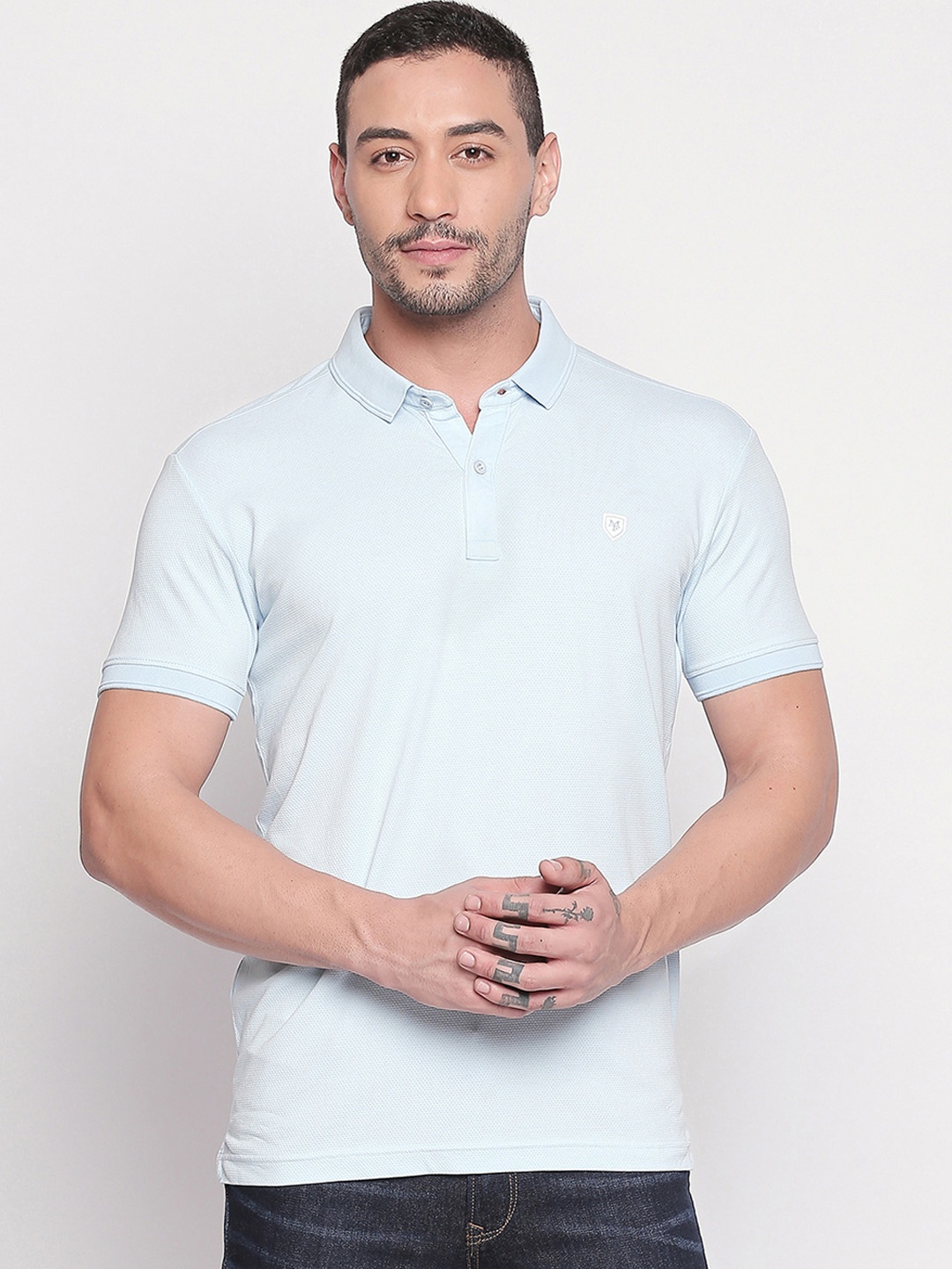 

Mufti Men Blue Solid Polo Collar Slim Fit T-shirt