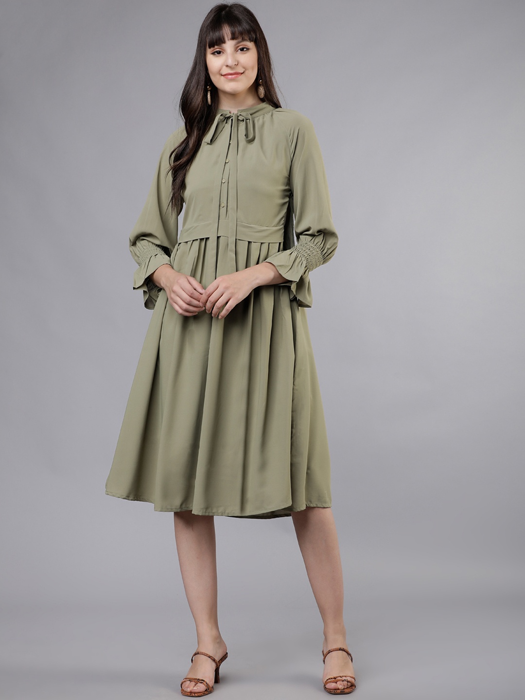 

Tokyo Talkies Women Olive Green Solid Fit and Flare Dress