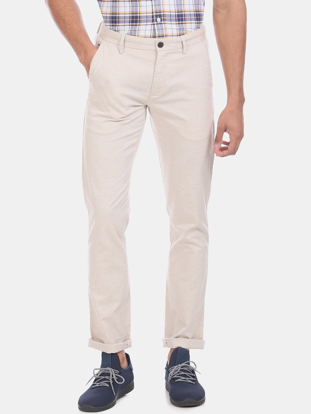 

Arrow Sport Men Beige Slim Fit Solid Regular Trousers