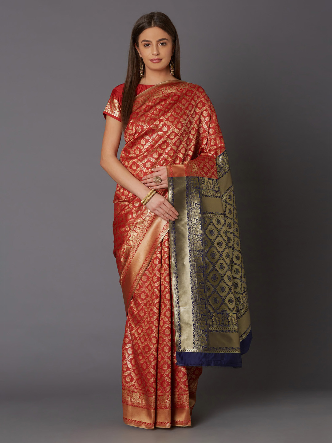 

Mitera Orange Silk Blend Woven Design Banarasi Saree