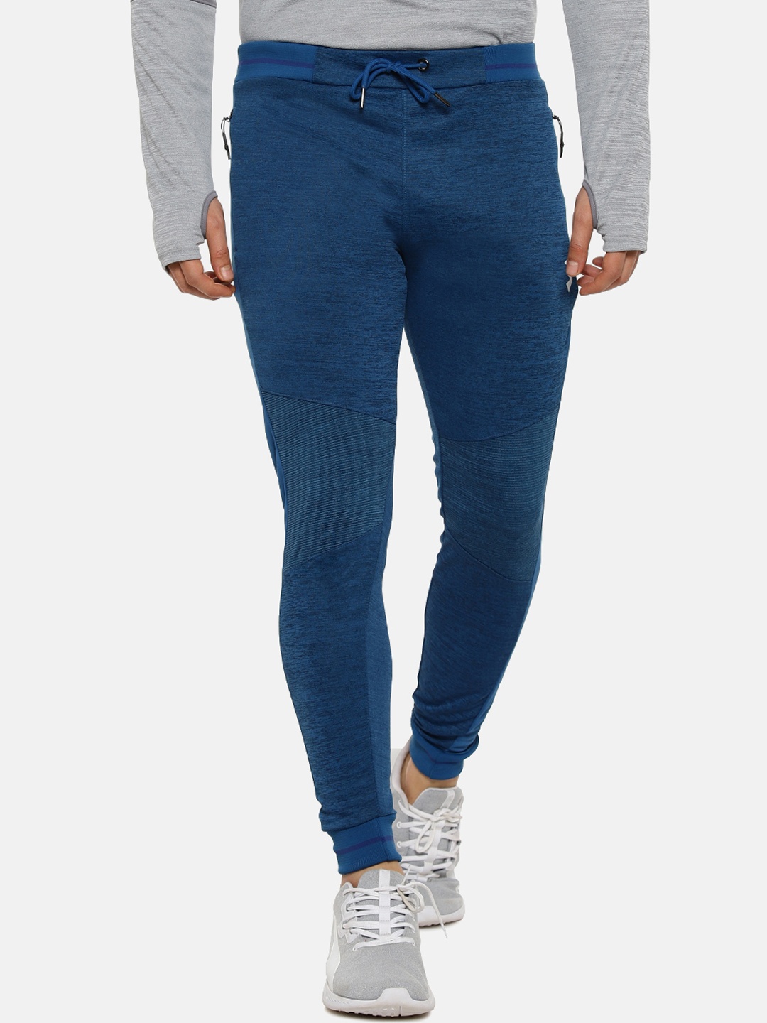 

Campus Sutra Men Teal Blue Solid Track Pants